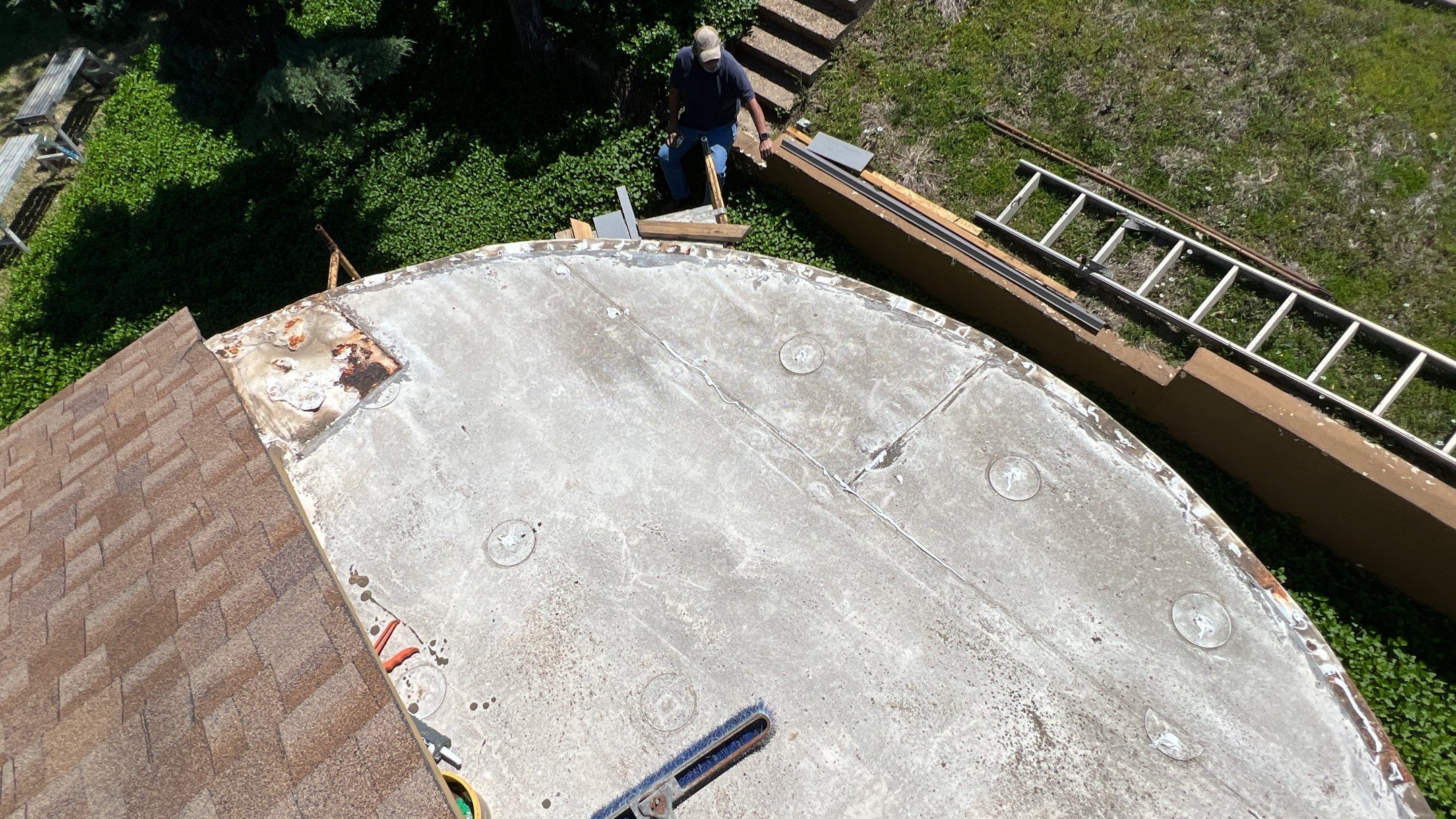 Residential Roofing Installation using TPO Flat Roof by Harvey Roofing & Construction