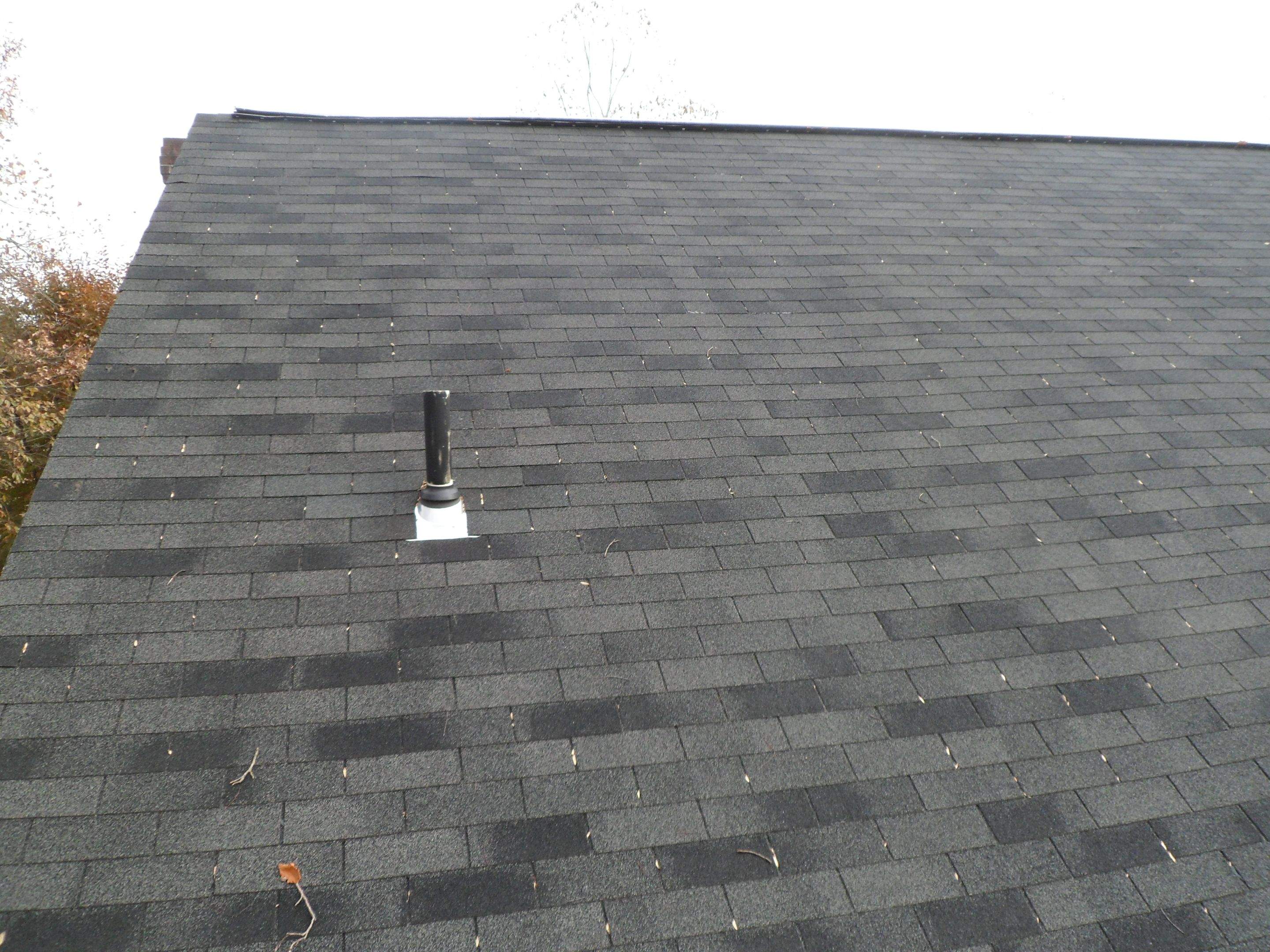 Residential Roofing Installation using Charcoal Black by Alpha Design Services