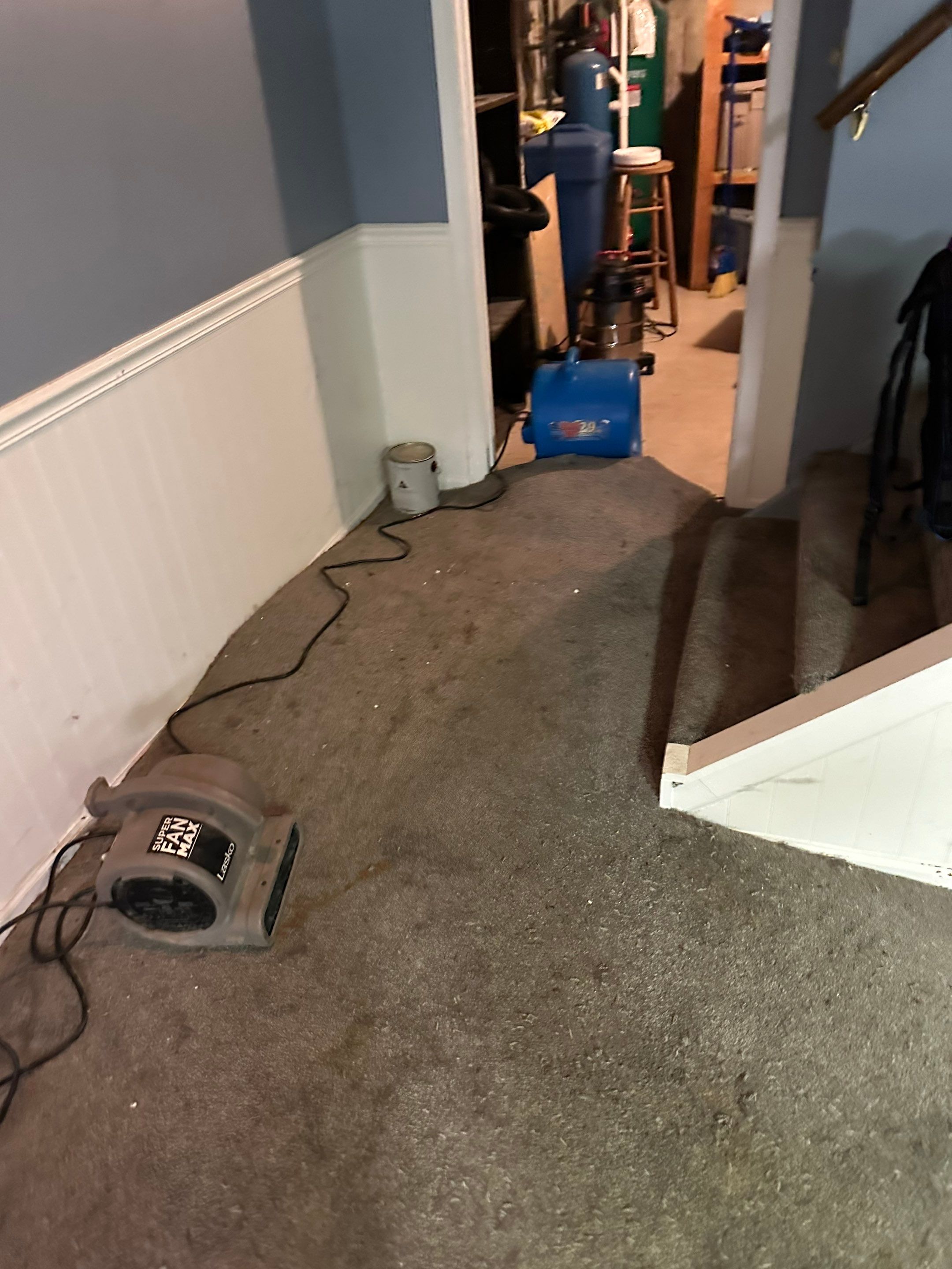 Granger storm water pushed through basement window and flooded the finished basement by BlueRed Restoration