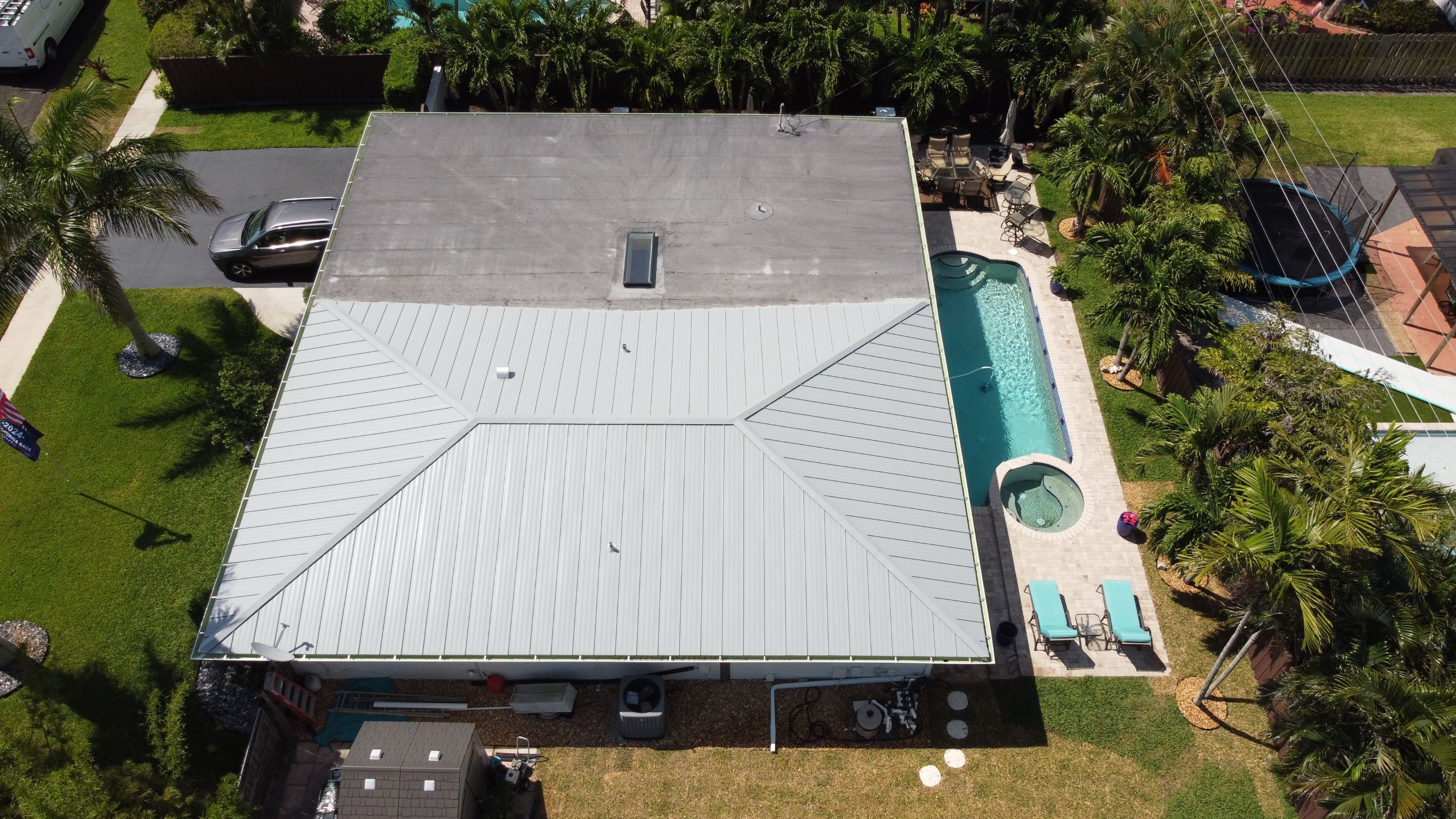 Residential Roofing Installation using 1" Nail strip metal roof by BLUES BROTHERS CONSTRUCTION CORP