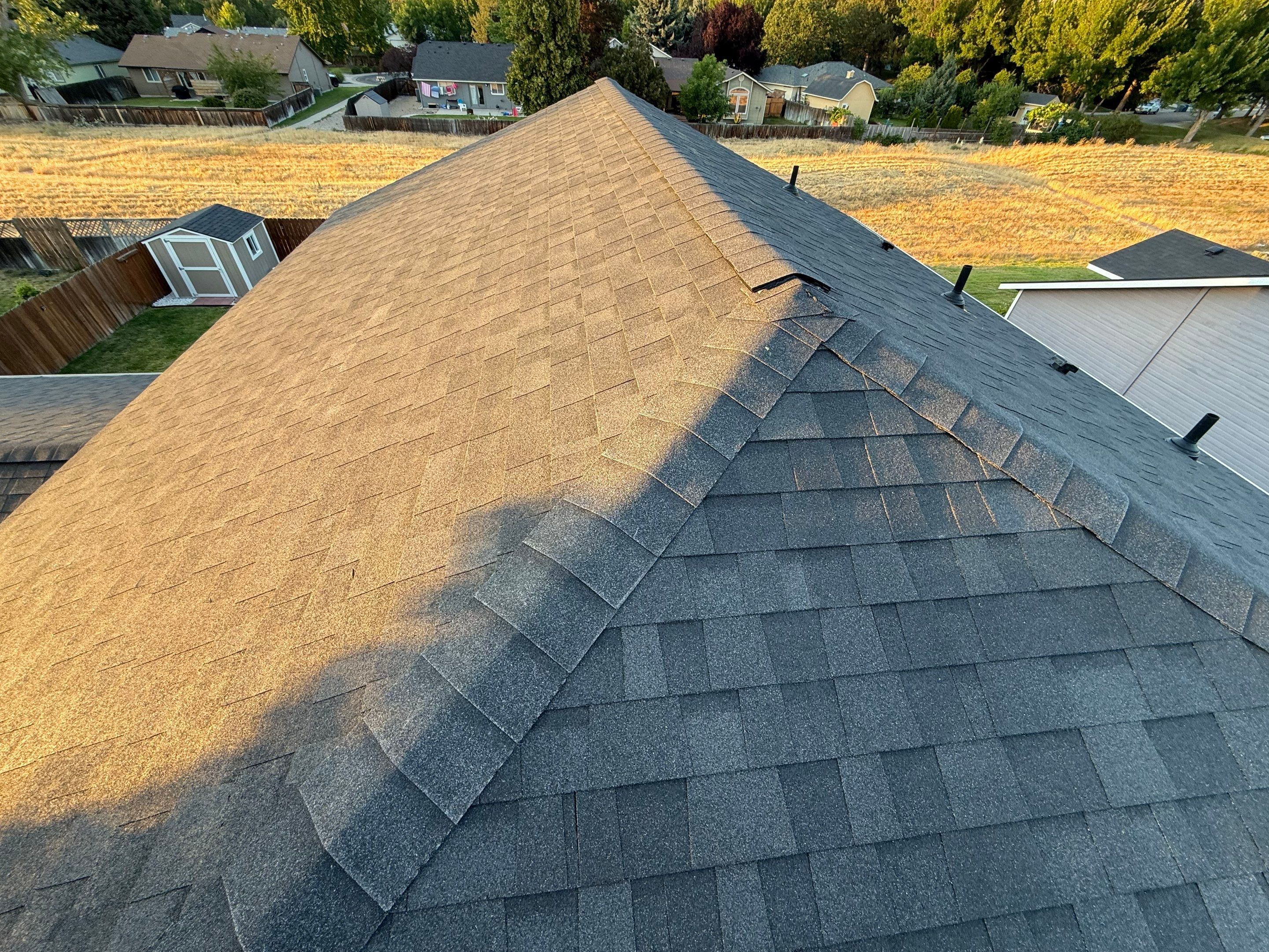 Residential Roof Replacement and Seamless Gutter Installation in Boise by Olive Roofing