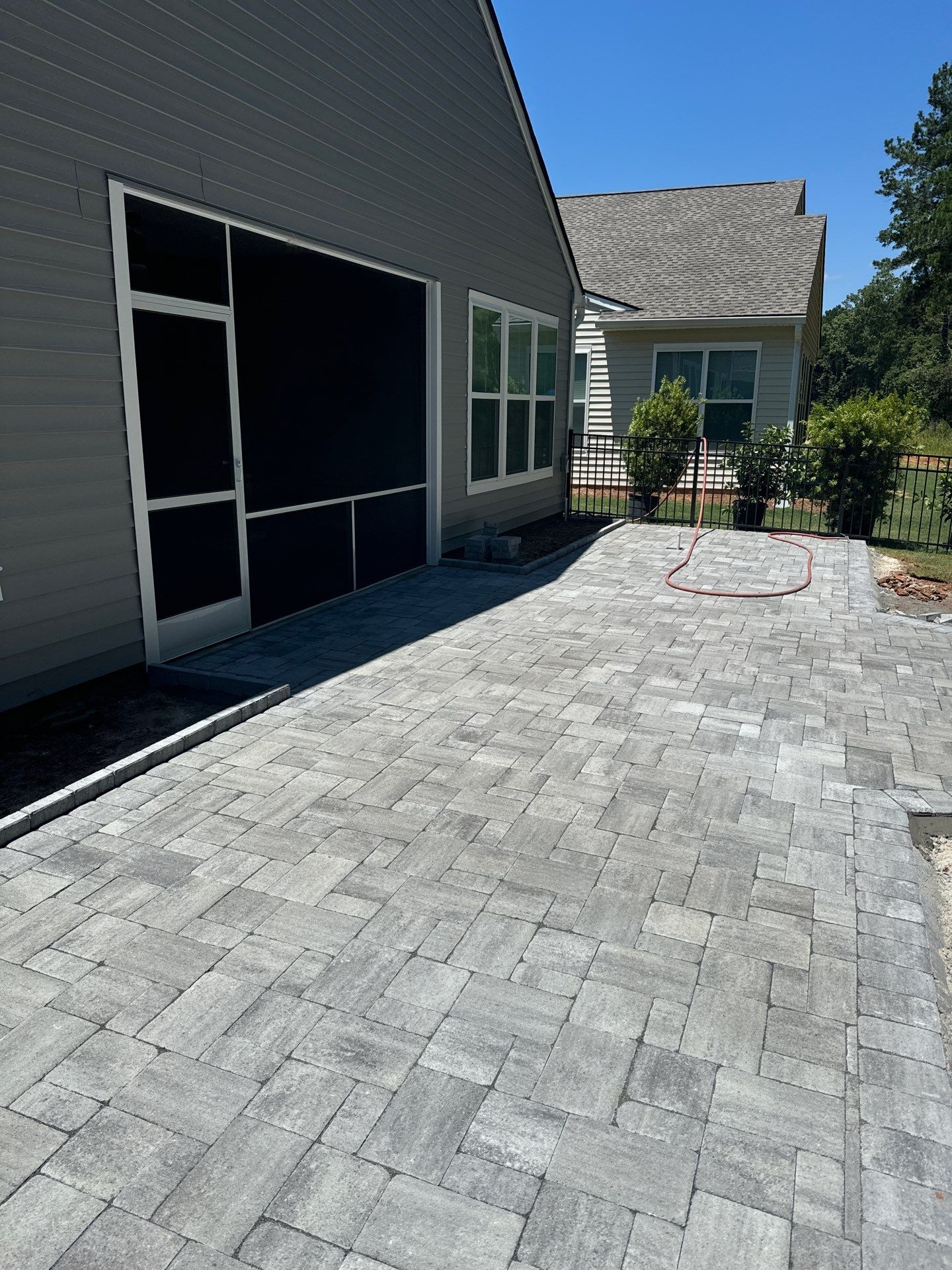 Custom Gray Stone Paver Patio Installation in Bluffton by Lowcountry Scapes, LLC