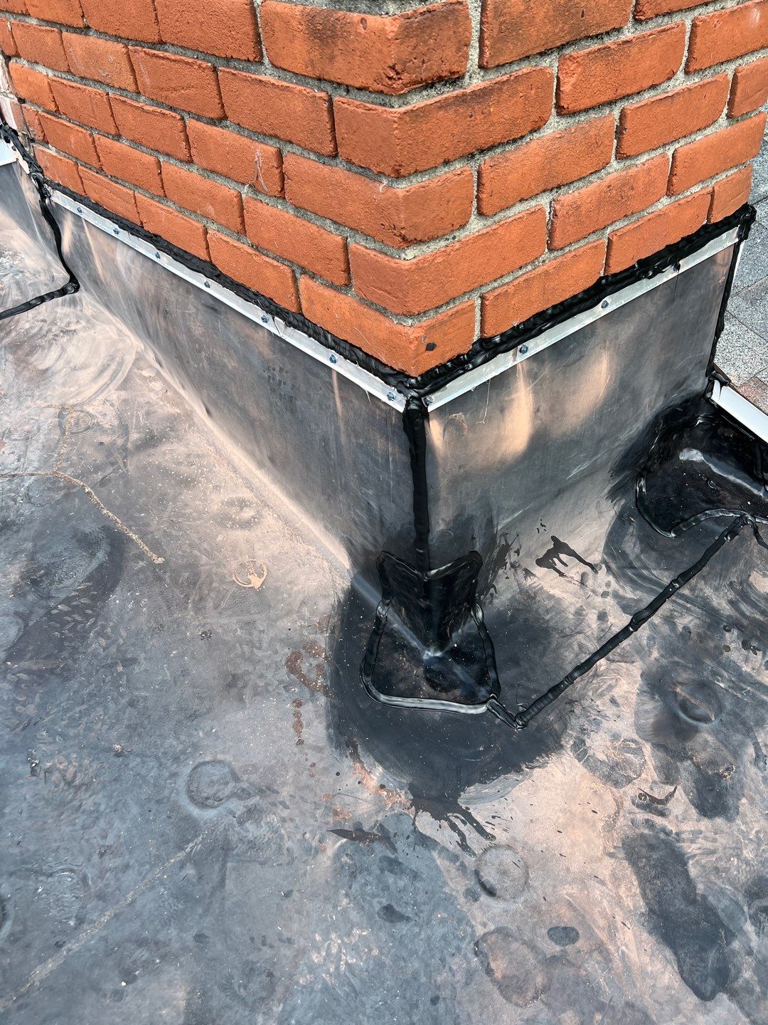 Residential Roofing Installation using 60 mil rubber roof  by Nitro Roofing and Construction