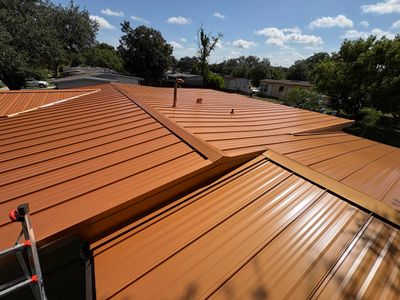 Standing Seam Metallic Copper Metal Roof Replacement in Deltona by Pinnacle Roofing Group