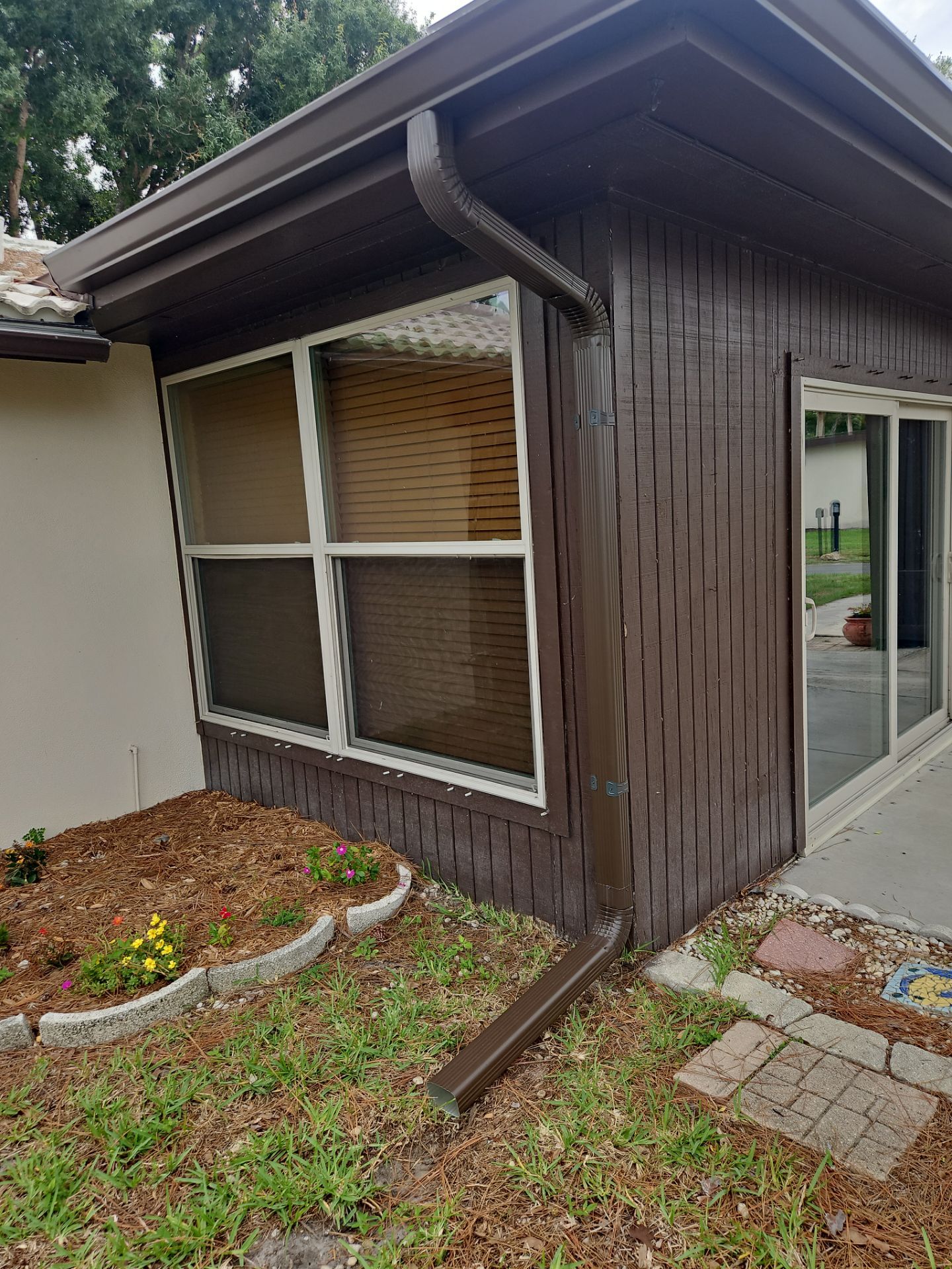 Seamless Aluminum Gutter Installation using Musket Brown Seamless Gutters in Nokomis FL by Gutter Professors