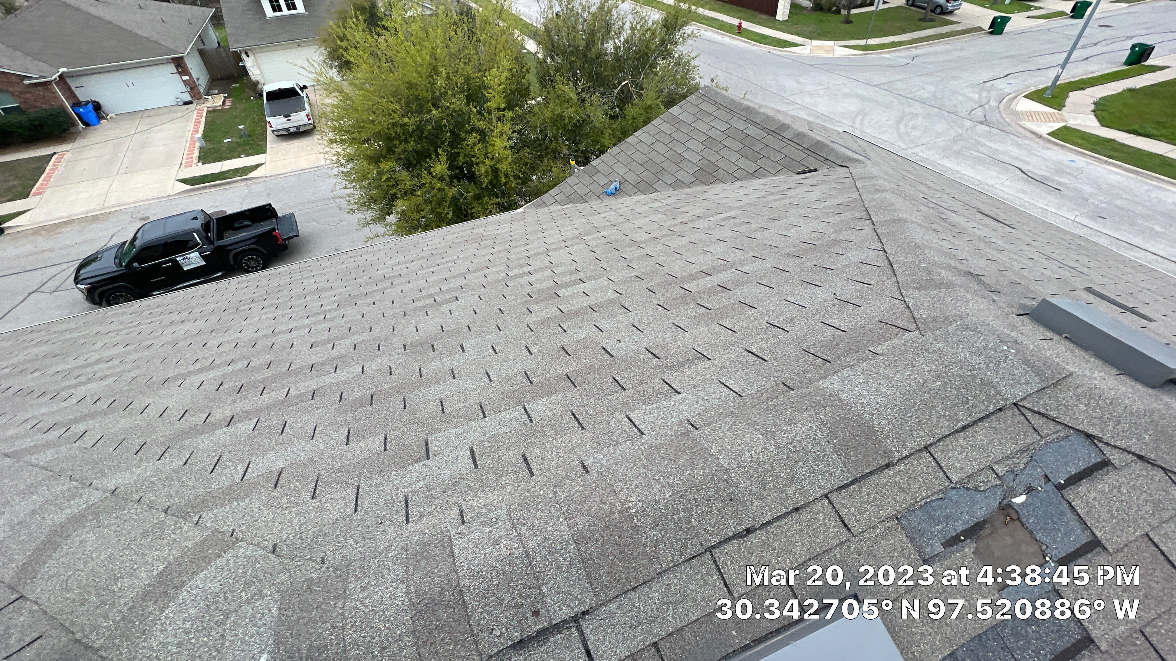 Residential Storm Damage Restoration and Roof Replacement in Manor by Caliber Restoration LLC