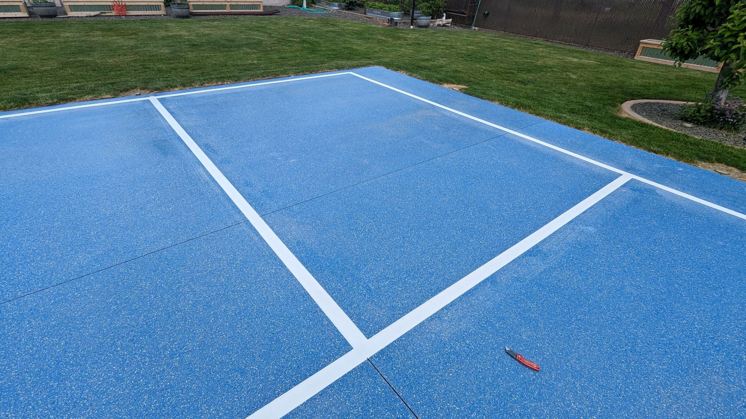 Sports Court Transformation using Ocean Hybrid by Croc Coatings, LLC