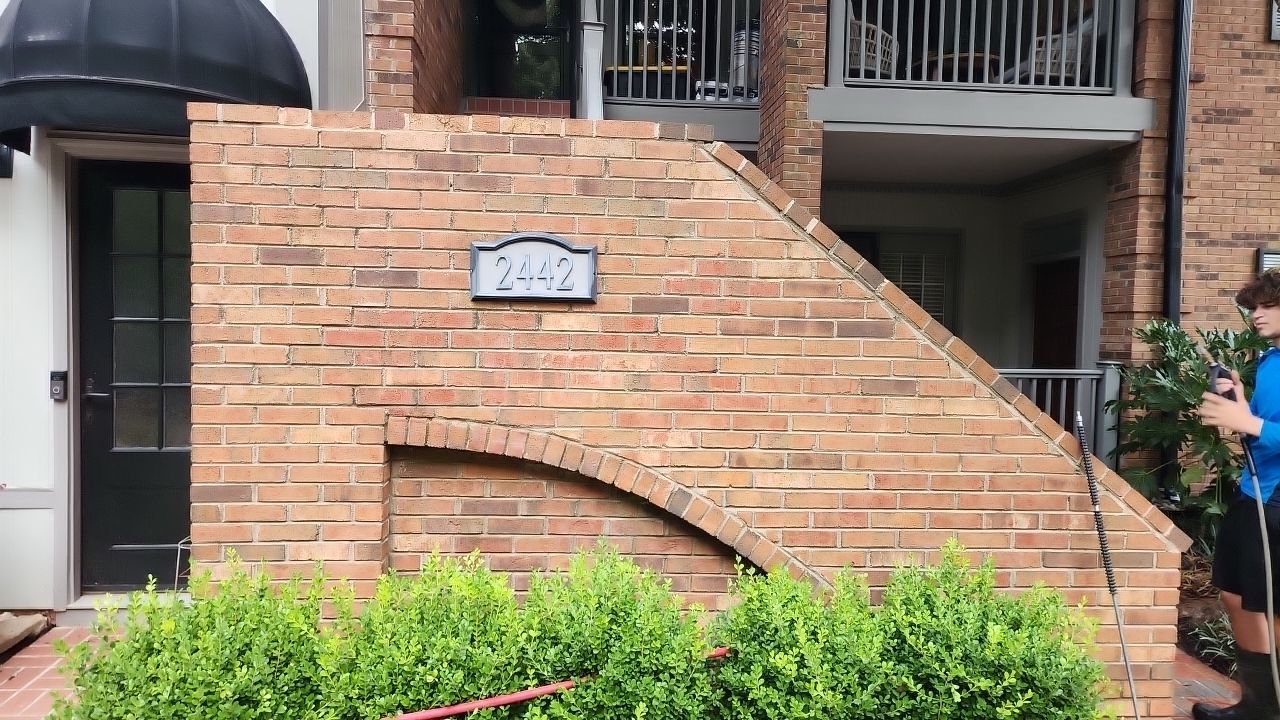 building clean using cleaner by Power Wash Masters LLC