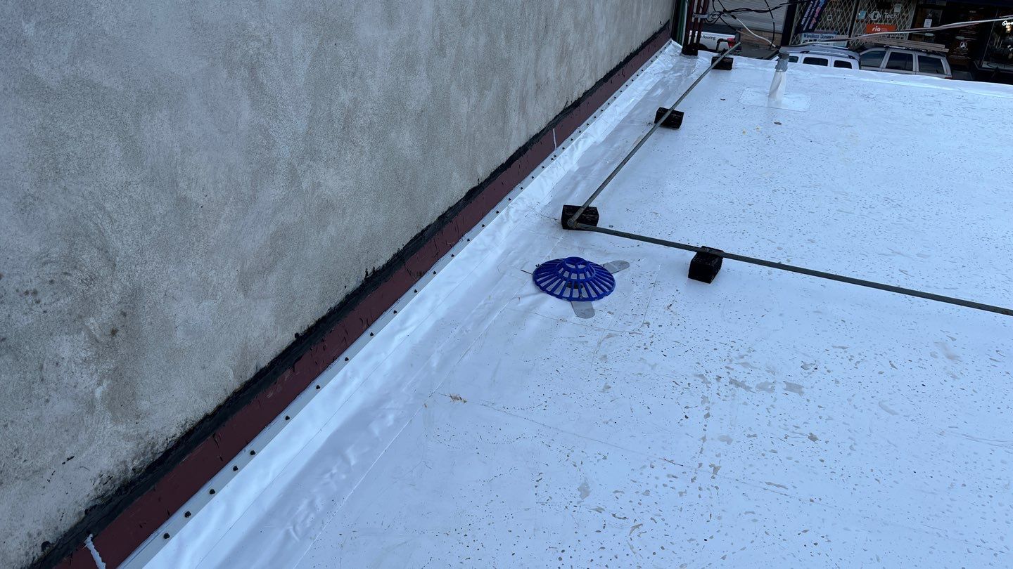 Residential ReRoofing Installation using Durolast by Top Notch Roofing Inc