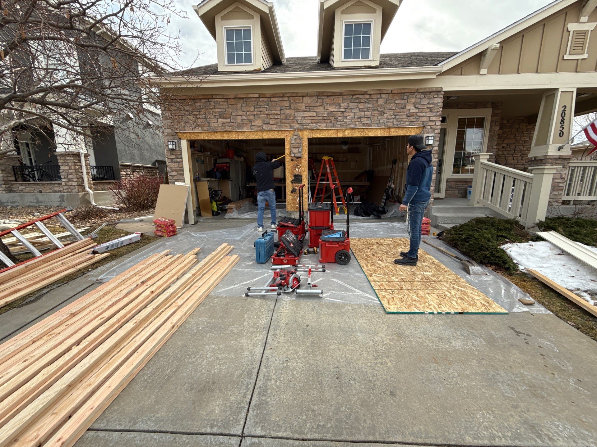 Garage door conversion by David & Goliath Contracting 