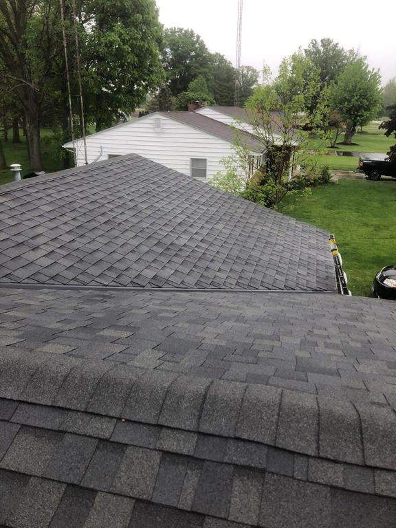 Residential Roofing Installation using 60 mil rubber roof  by Nitro Roofing and Construction