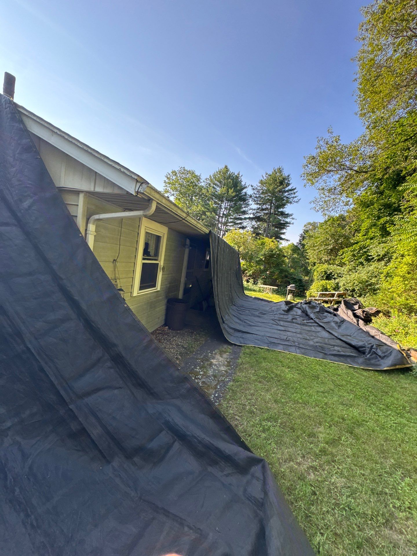 Onyx Black Roof Transformation in Maynard, MA by Mighty Dog Roofing of Greater Middlesex County