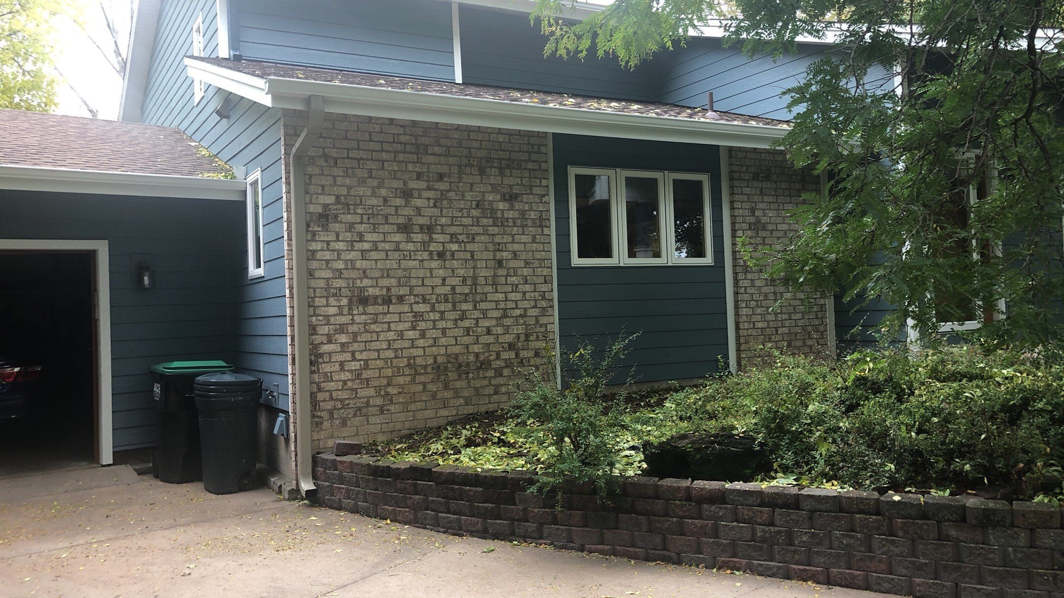 Siding Installation using LP SmartSide and Pella Vinyl Windows by MODERN EXTERIOR SYSTEMS