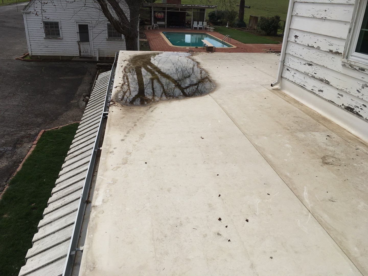 Residential Roofing Installation using Standing seam metal roofing system by Straight Edge Roofing Inc