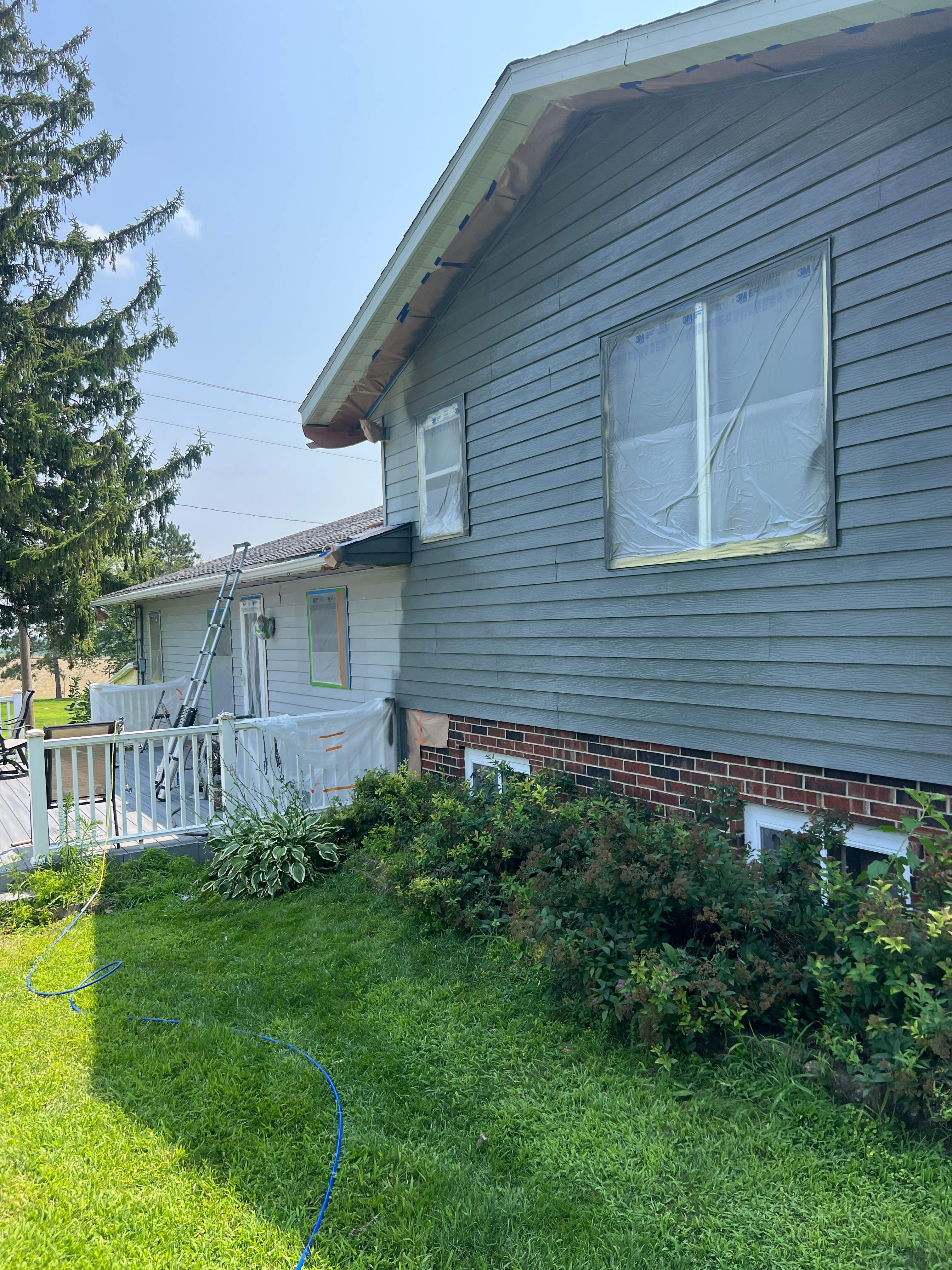 Aluminum Siding Repaint by Grandview Painting