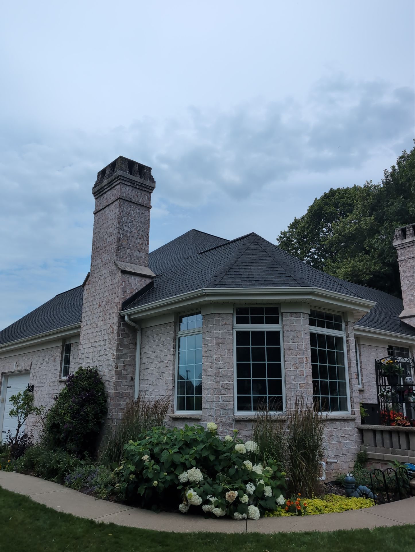 Classic Stucco Beauty  by Gellings Roofing & Siding