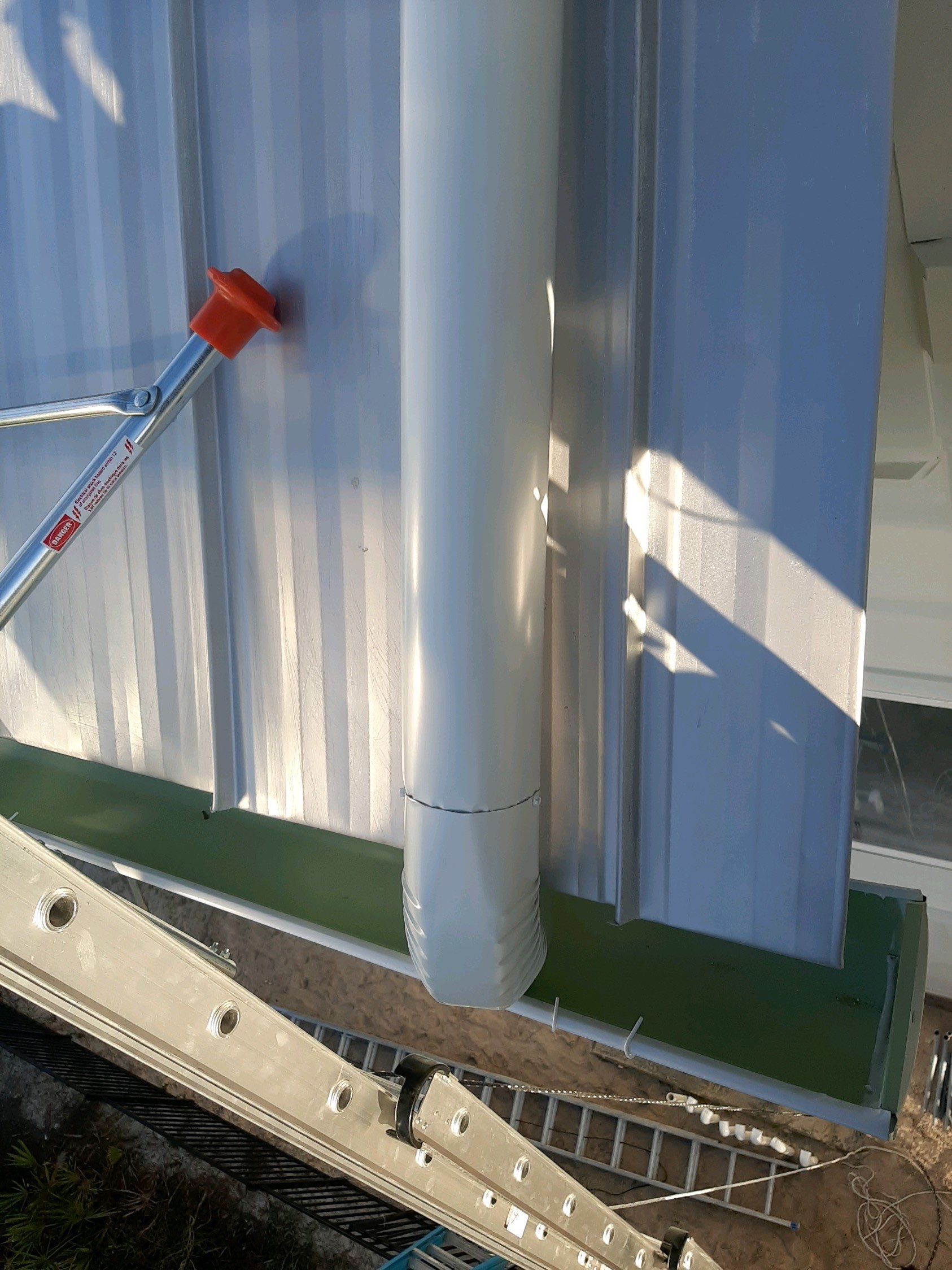 Gutter Installation Using 6 Inch Seamless Aluminum Gutters by Gutter Professors