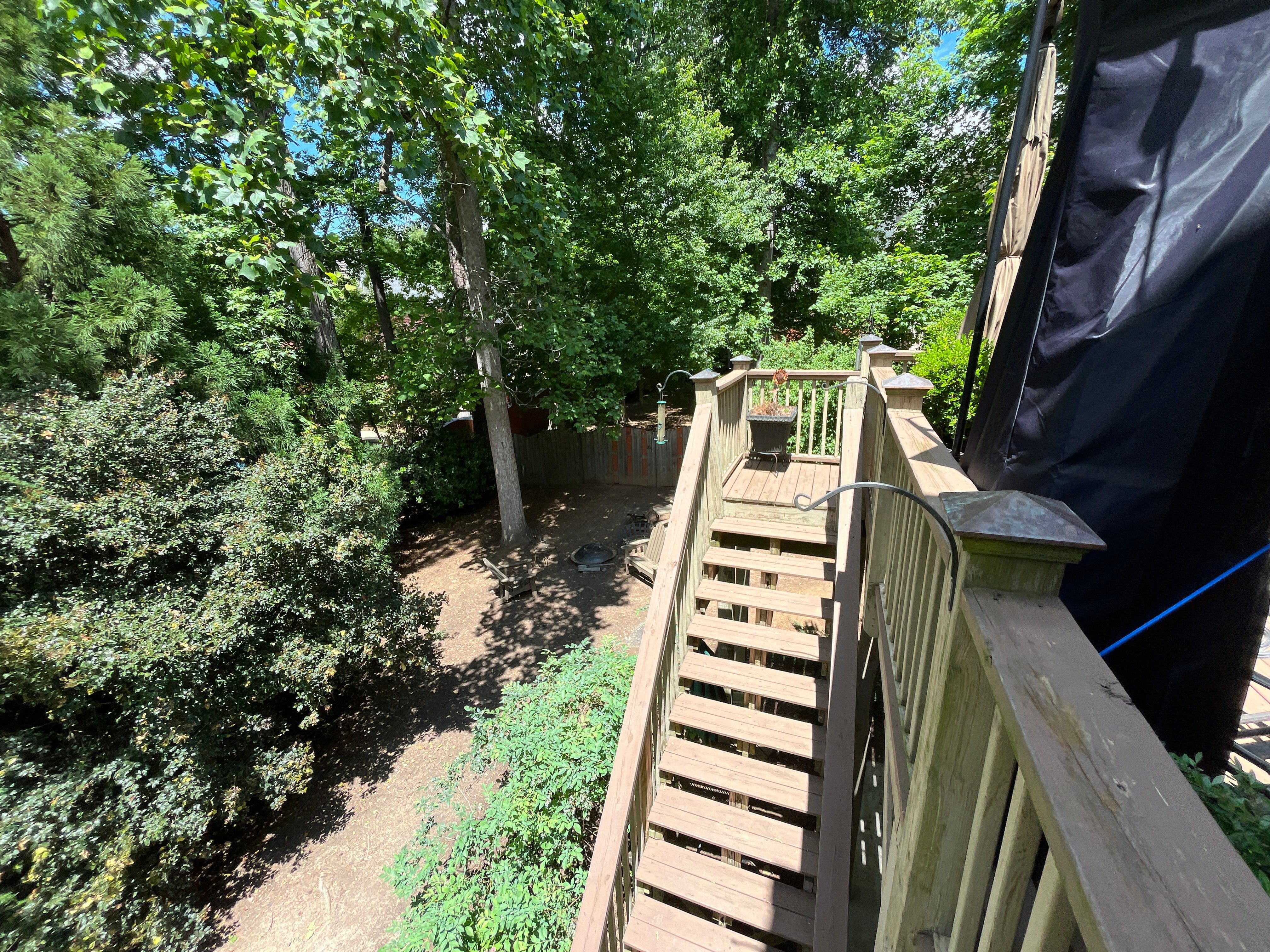 Tucker, GA Covered Porch Build and Deck Replacement using Deckorators Voyage Series Decking by Nelson Exteriors 