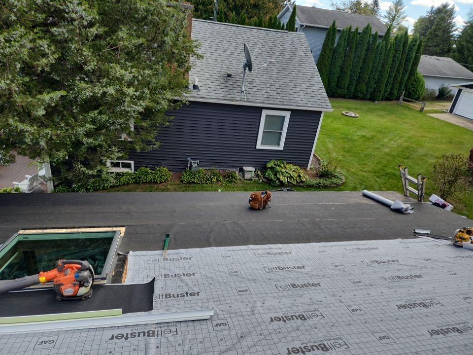 Residential Roof Installation and Skylight Replacement in Kiel, WI by Gellings Roofing & Siding