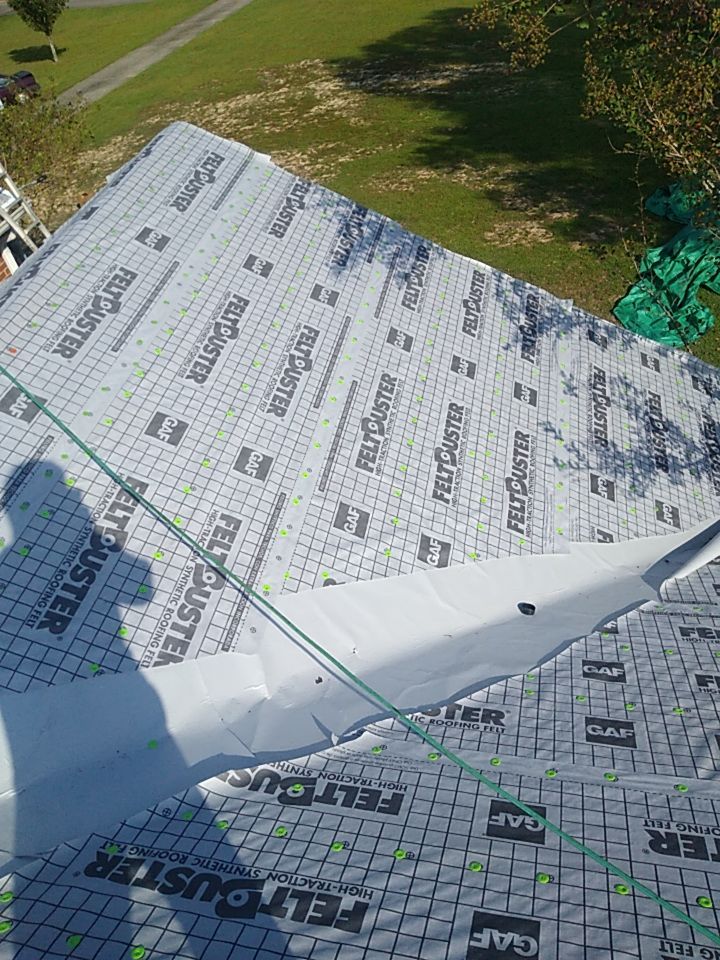 Residential Roofing Installation using Roof Replacement by American Roofing & Construction LLC