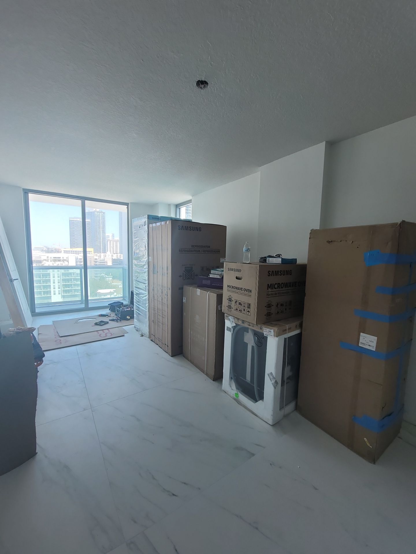 Modern High-Rise Interior Renovation and Custom Tile Installation in Miami by Picos Construction Engineering