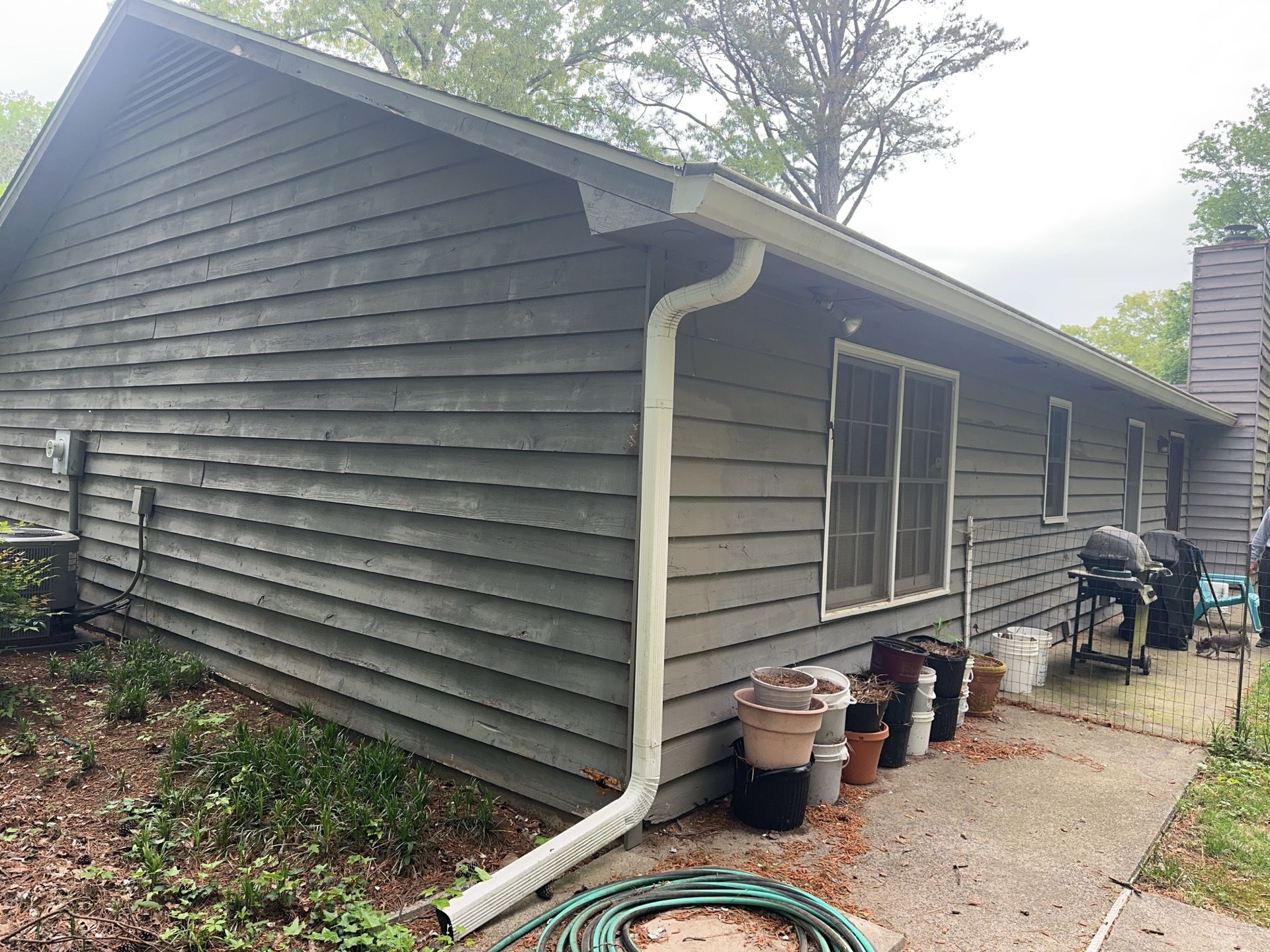 Marietta, GA Exterior Painting Transformation with Blue Paint by Nelson Exteriors