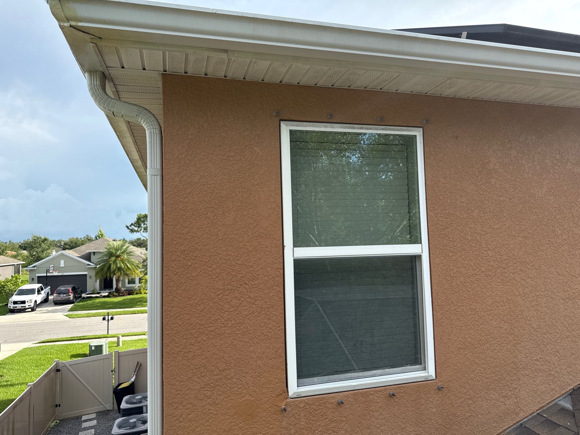 Full Exterior Cleaning – Two-Story House, Gutters, and Fence in Old Mill Preserve, Palmetto, FL by Sunshine AquaWash