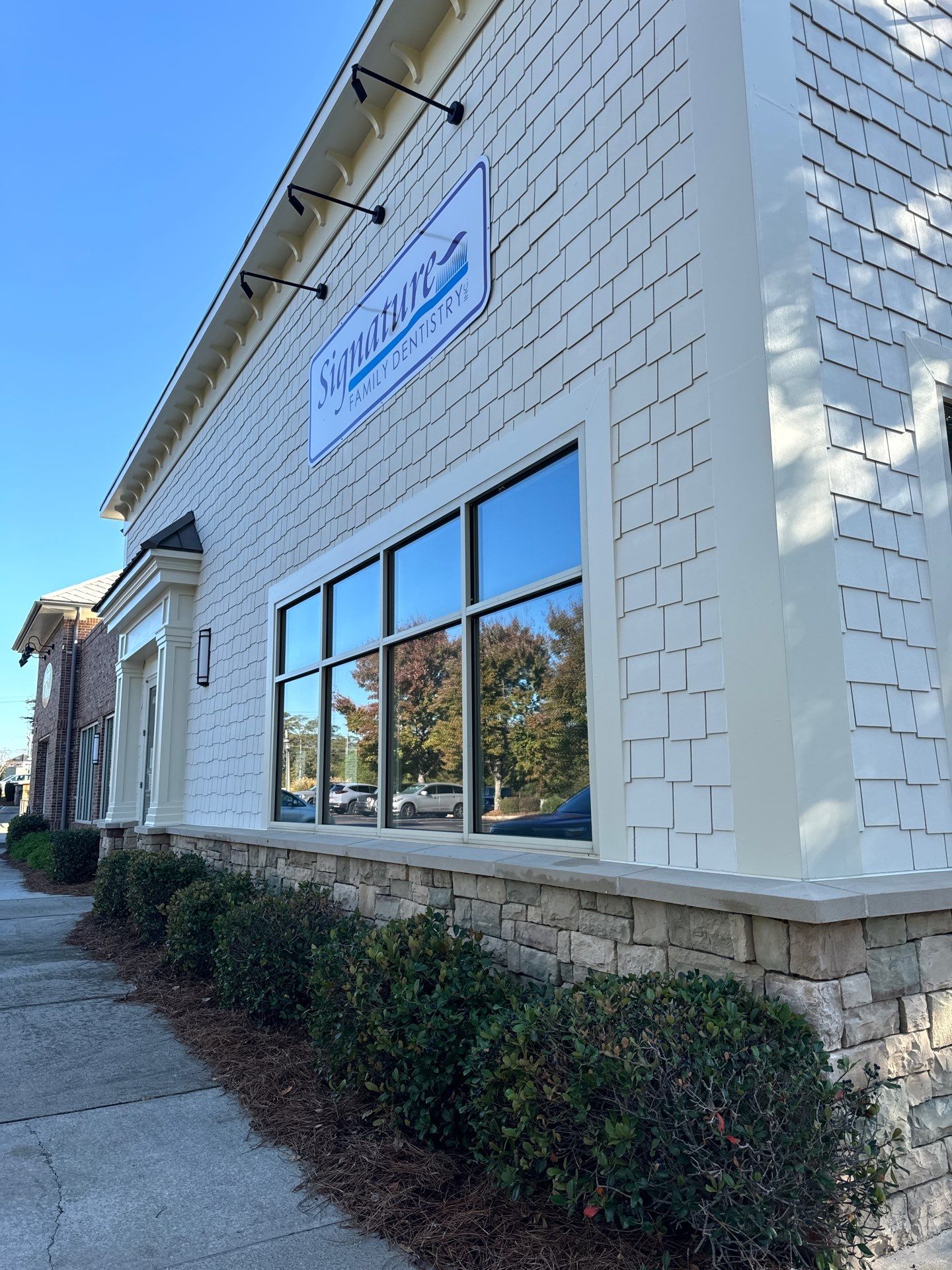 Commercial Exterior & Stairwell Painting – Corner Market by Praise God Painting, LLC