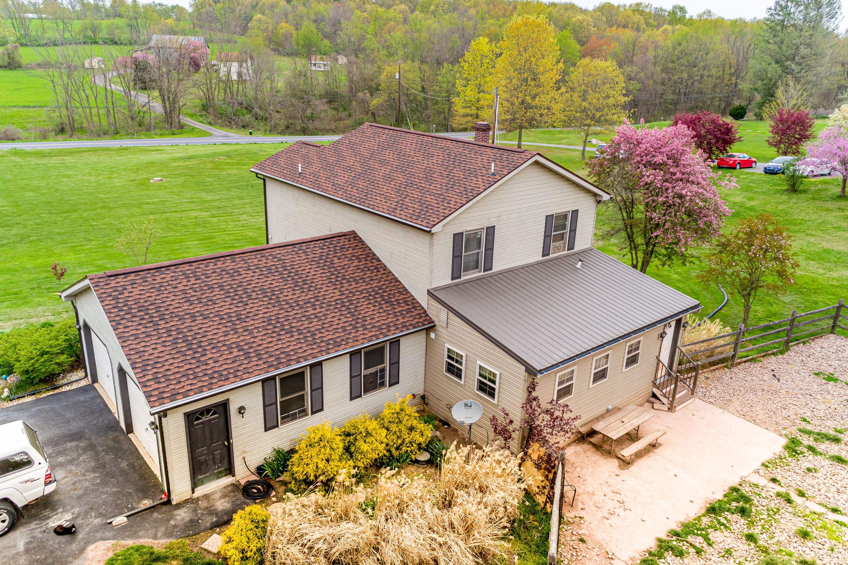 Shingle Roof-hickory, Metal Roof-bronze, Garage addition by Esh Builders