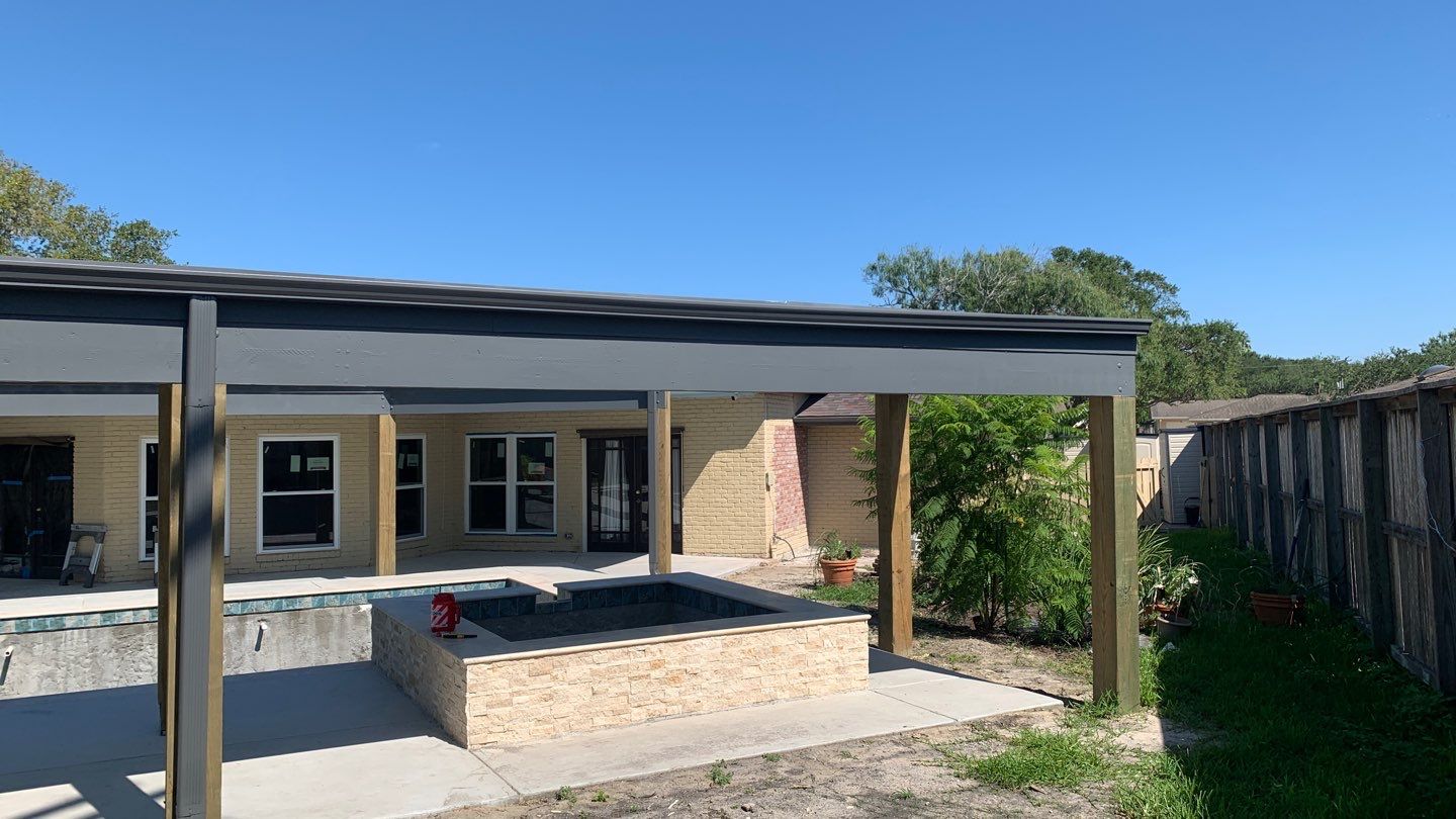 Beautiful pool side build by Bayfront Roofing and Construction