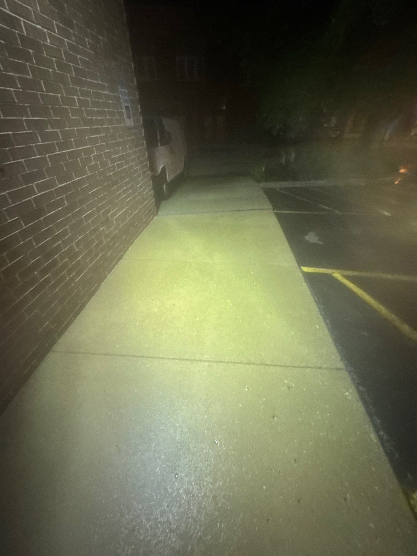 Commercial sidewalk cleaning. by Northern Power Washing LLC.