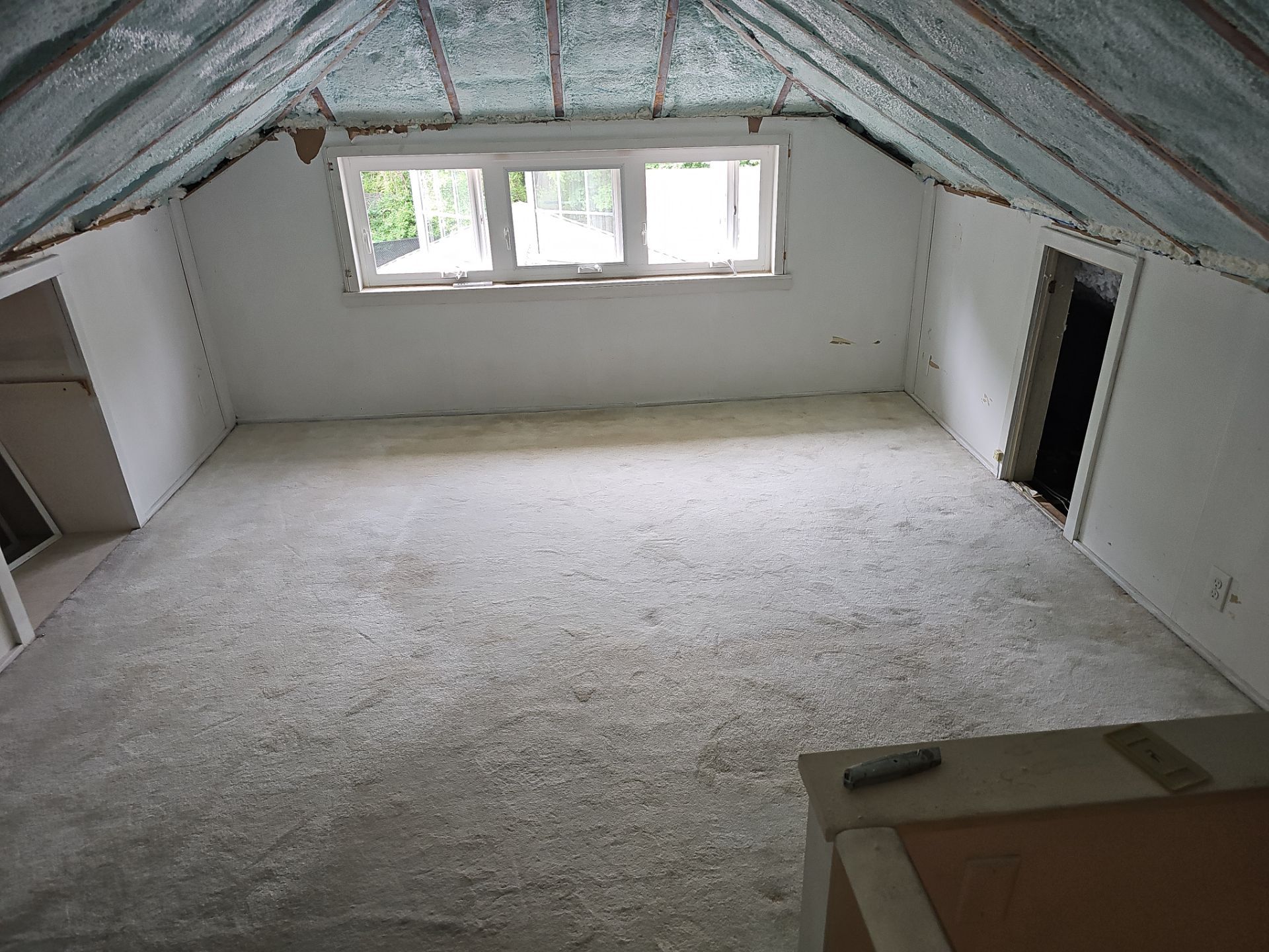 Attic Insulation using open cell spray foam by NYS Foam & Energy