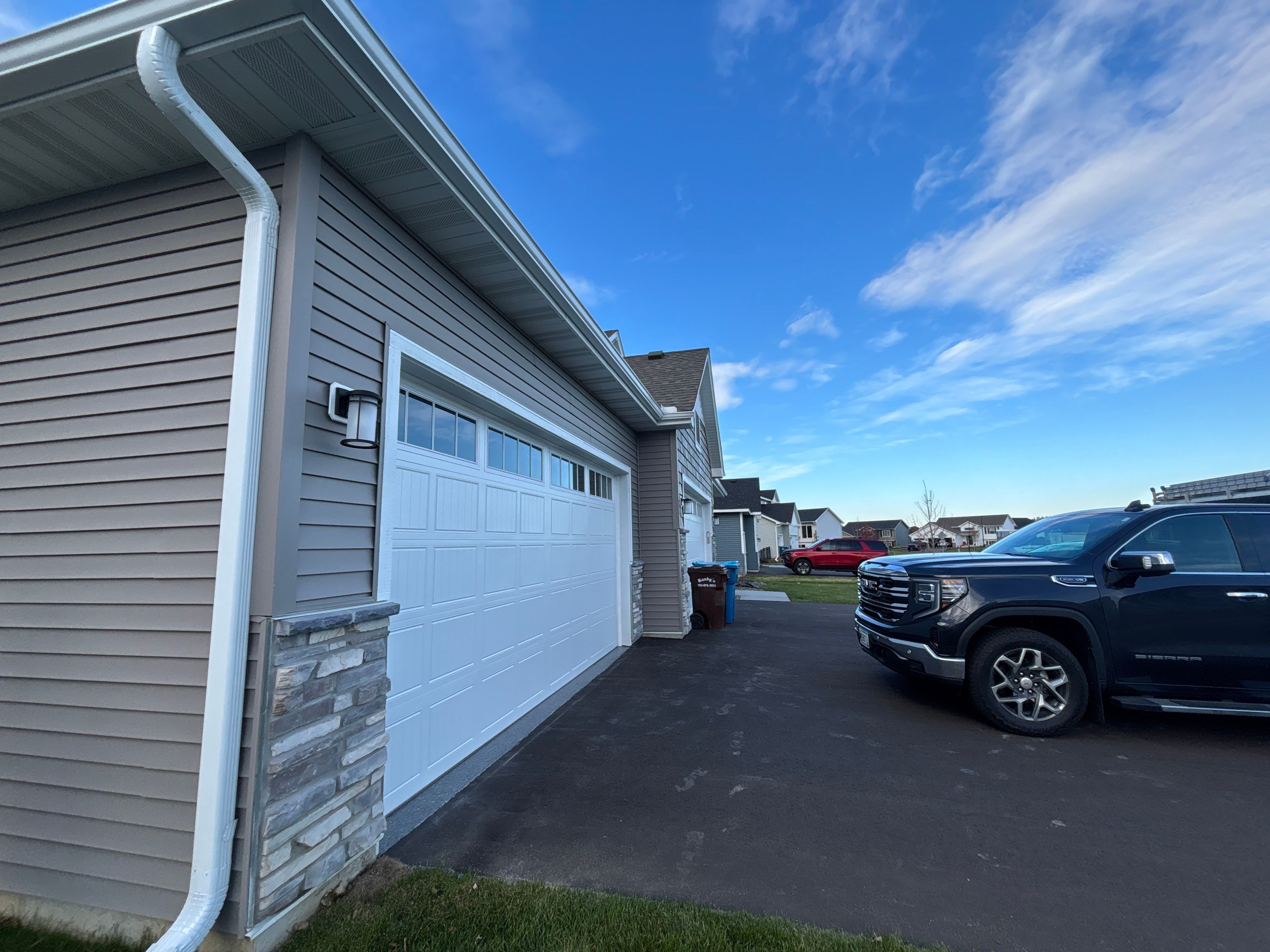 5-Inch Seamless Gutter Installation with Black Steel Screens – Buffalo, MN by Next Level Seamless Gutters / Exteriors Inc.