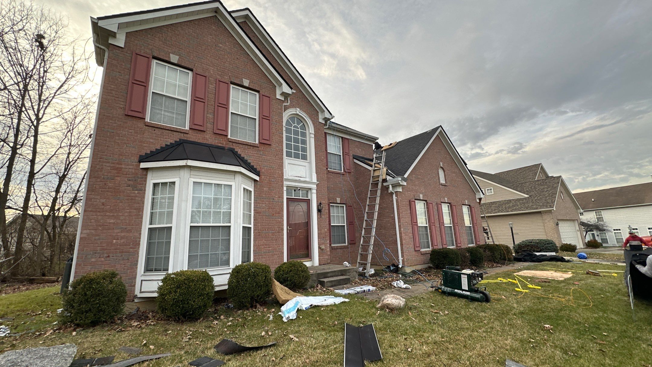 Walden Ponds - Pristine Black and Hydro Flo Gutter Guards by Tamlin Roofing