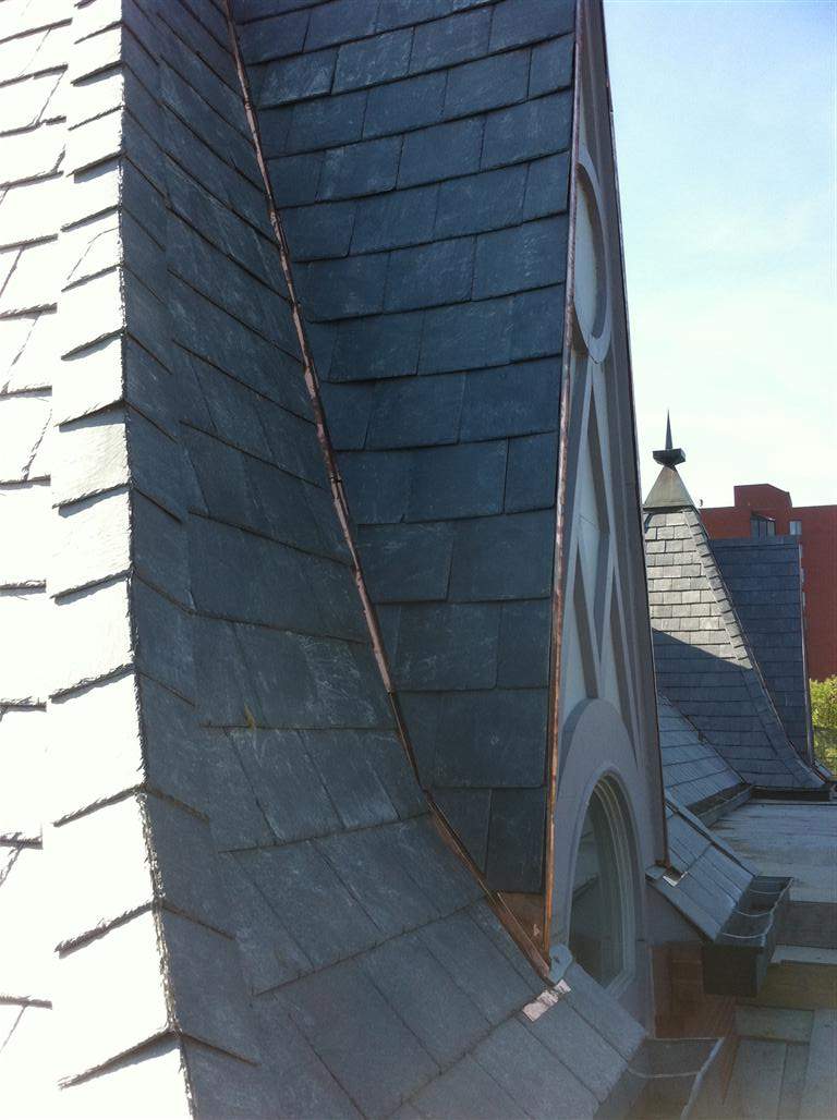 Historic Building ROOF REPLACEMNT with GAF TruSlate  on steep slop and Versico 60mil TPO on flat roof by Gorilla Exteriors Contracting, LLC