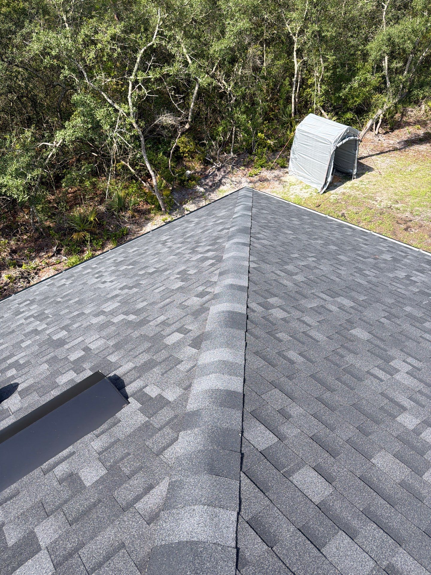 GAF Asphalt Shingle Roof Replacement with Skylight in Eustis by Fortified Roofing Solutions Corp.