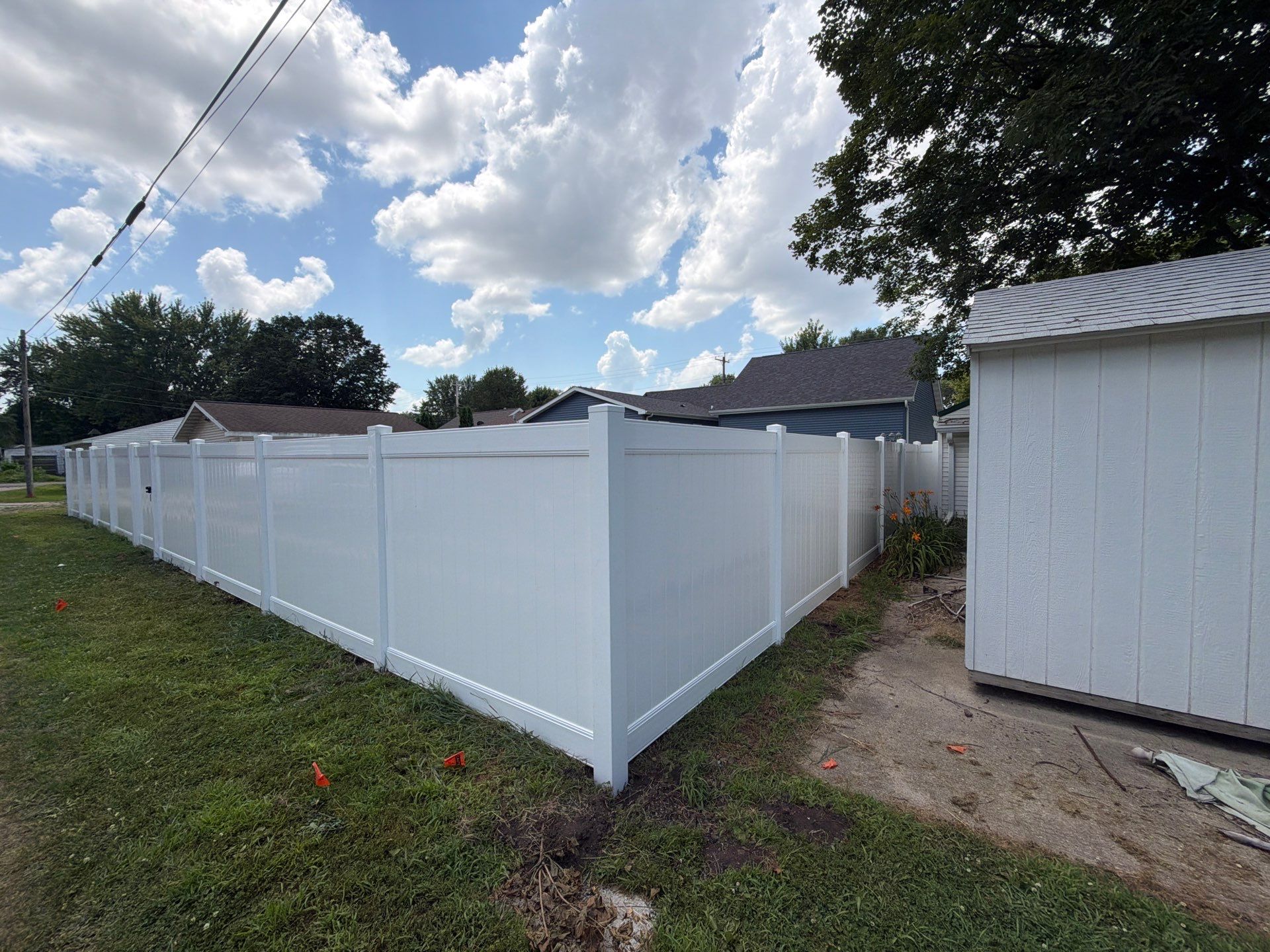 White Vinyl Privacy Fence Installation in Waterloo, Iowa by Perfect Picket Fence and Stain