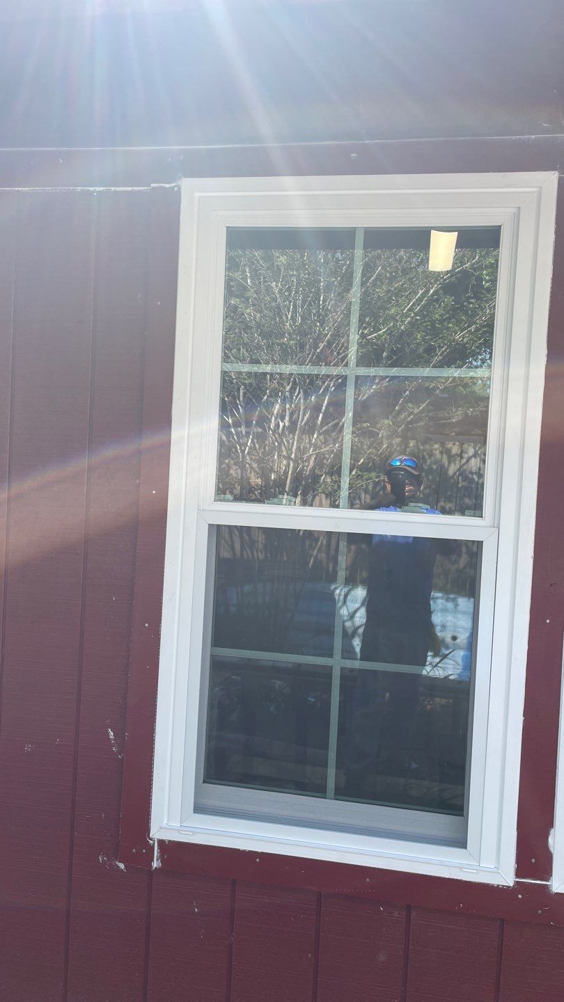 Black and white and red all over by Bayfront Roofing and Construction