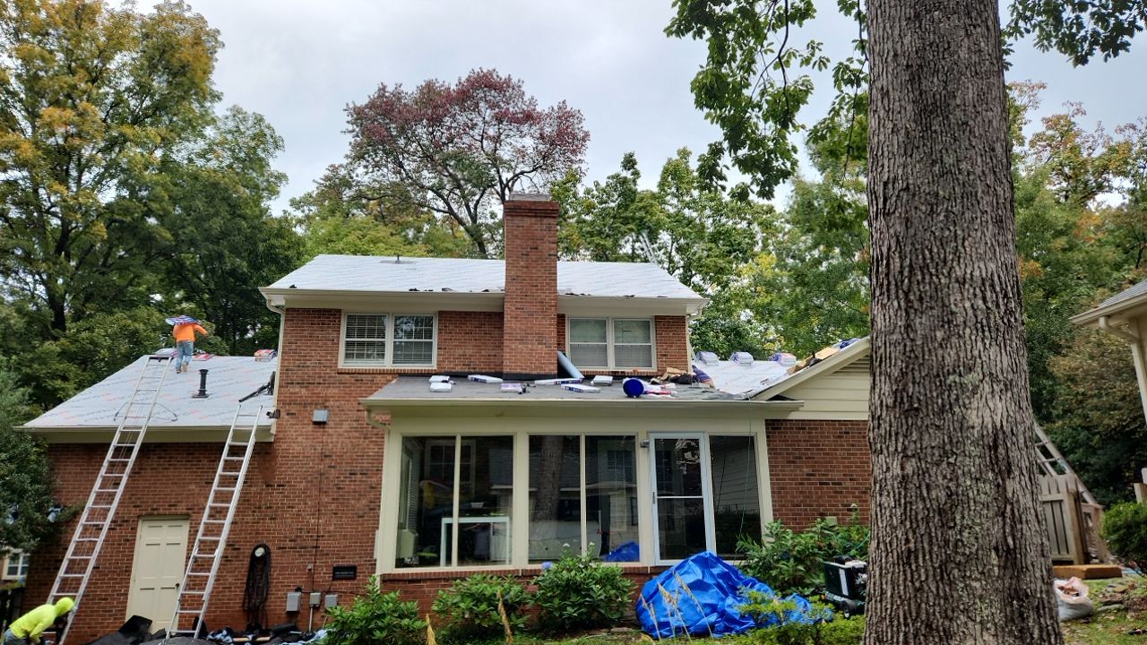 New Roof with Solar Panels by Just In Time Roofing and Restoration
