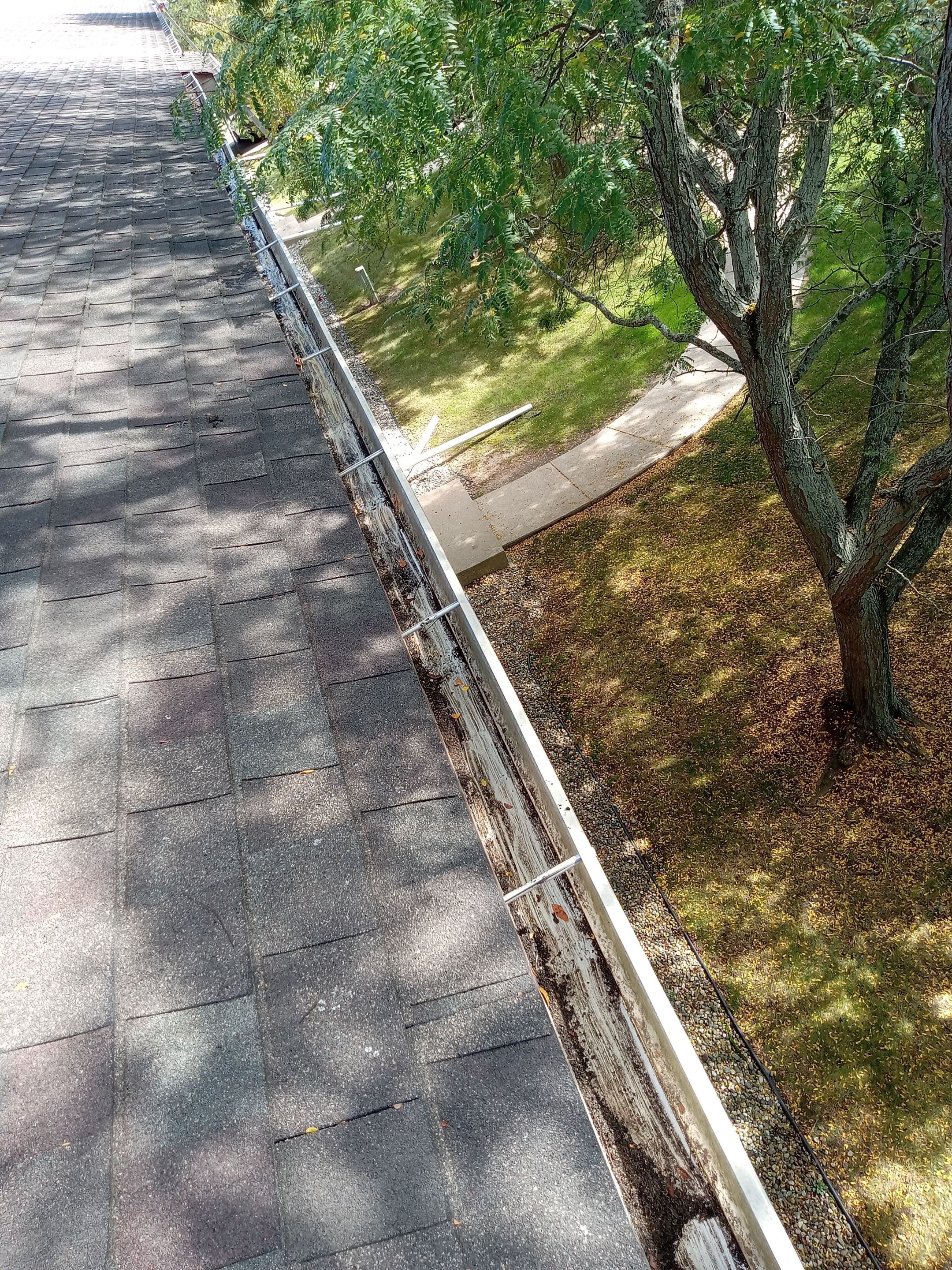 Commercial gutter cleaning Lansing after photo with clean gutters