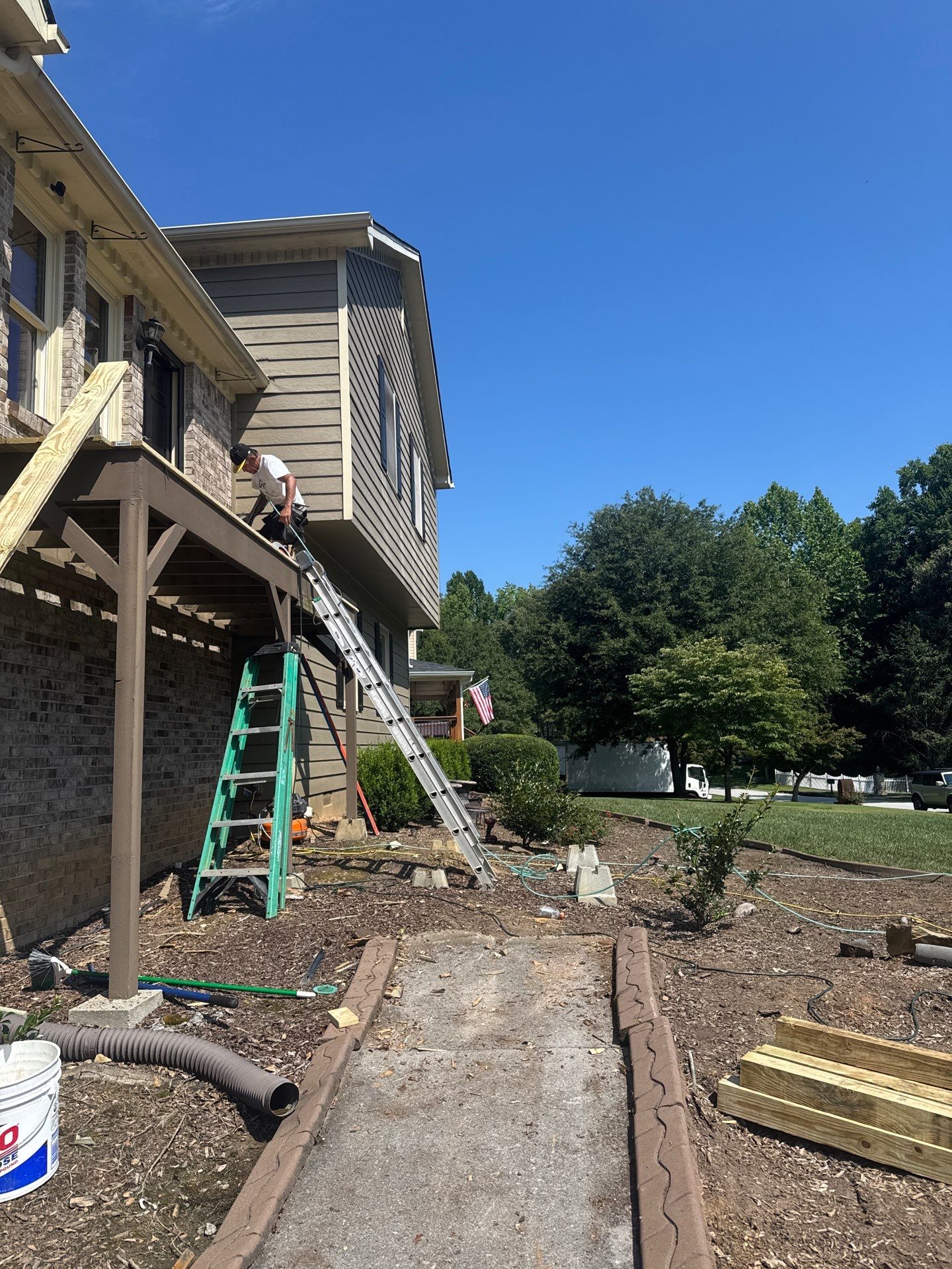 Elevated Pressure-Treated Deck and Staircase Build in Powder Springs by Swift Home Renovations