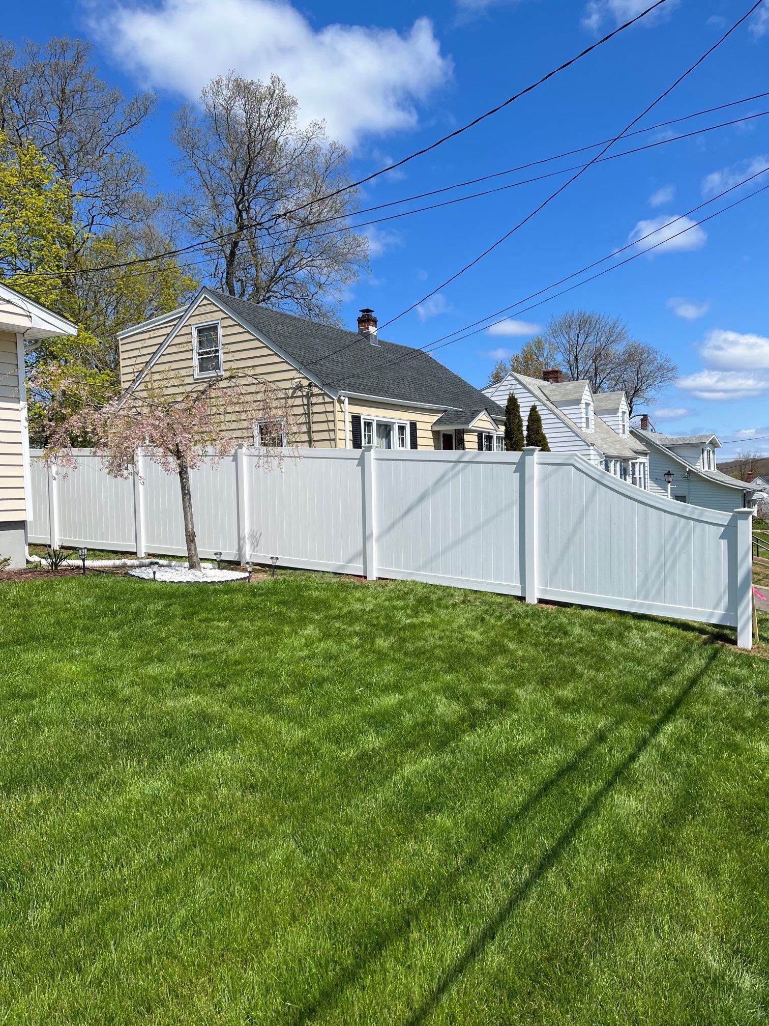 New 6' Tall Vinyl Privacy Fence, with Transition.  by DiGiorgi Roofing and Siding Inc