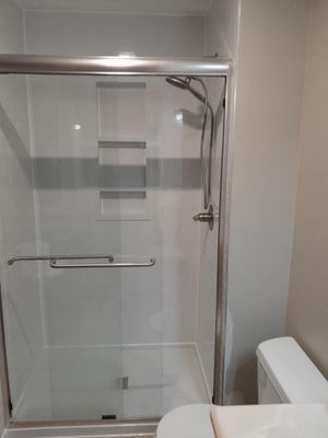 Maintenance free shower with door