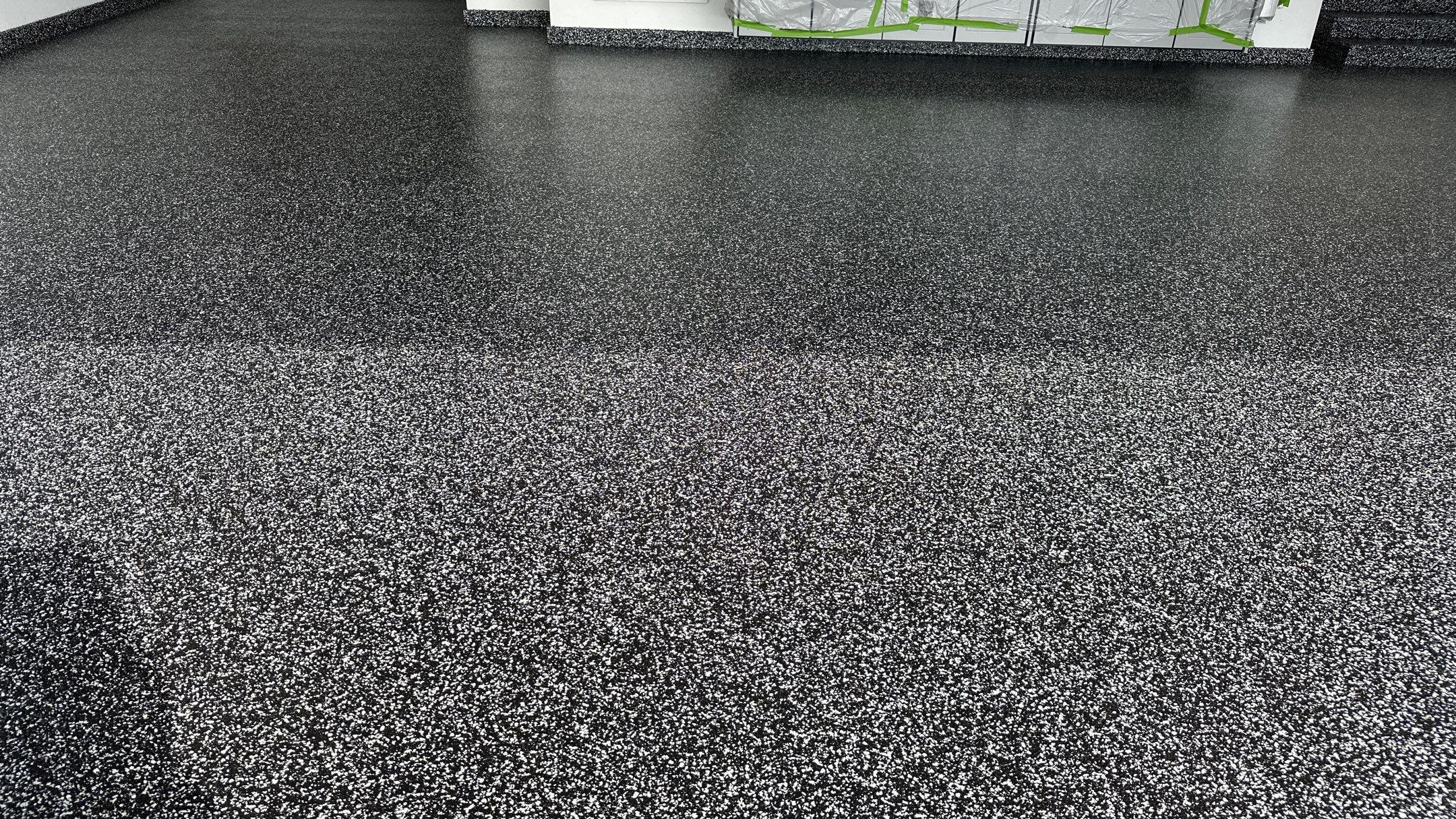 John H. received his dream garage with cabinets and a Banner Garage Floor by Banner Garage