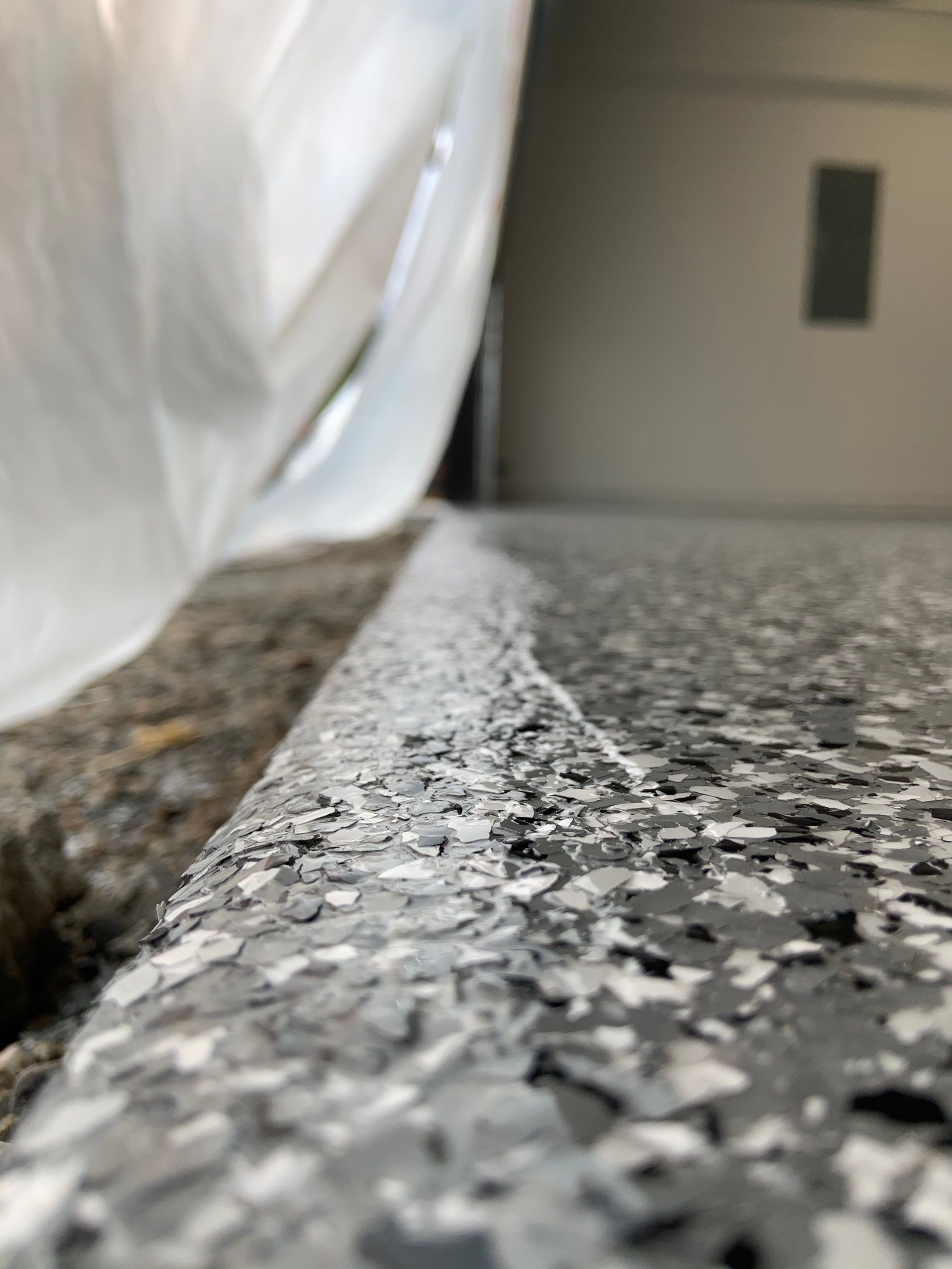 Garage Transformation using Smoke by Croc Coatings, LLC