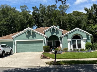 Stucco Exterior Repainting with White Soffits & Fascia | Hampton Park, Jacksonville, FL
