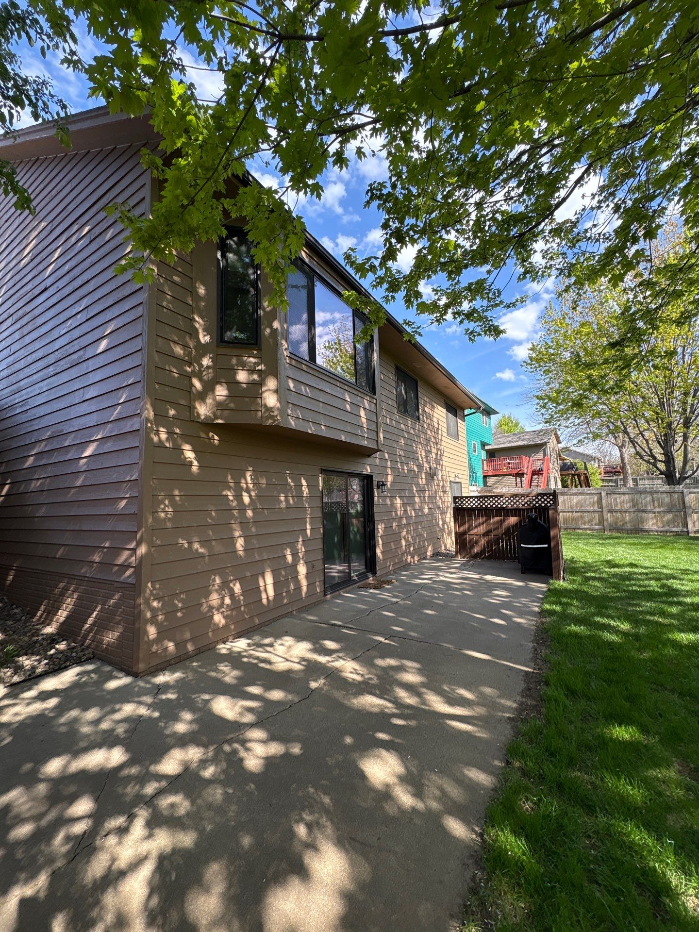 Wood Siding Restoration and Exterior Painting in Sioux Falls by Select Painting, Coatings & Garage Cabinets