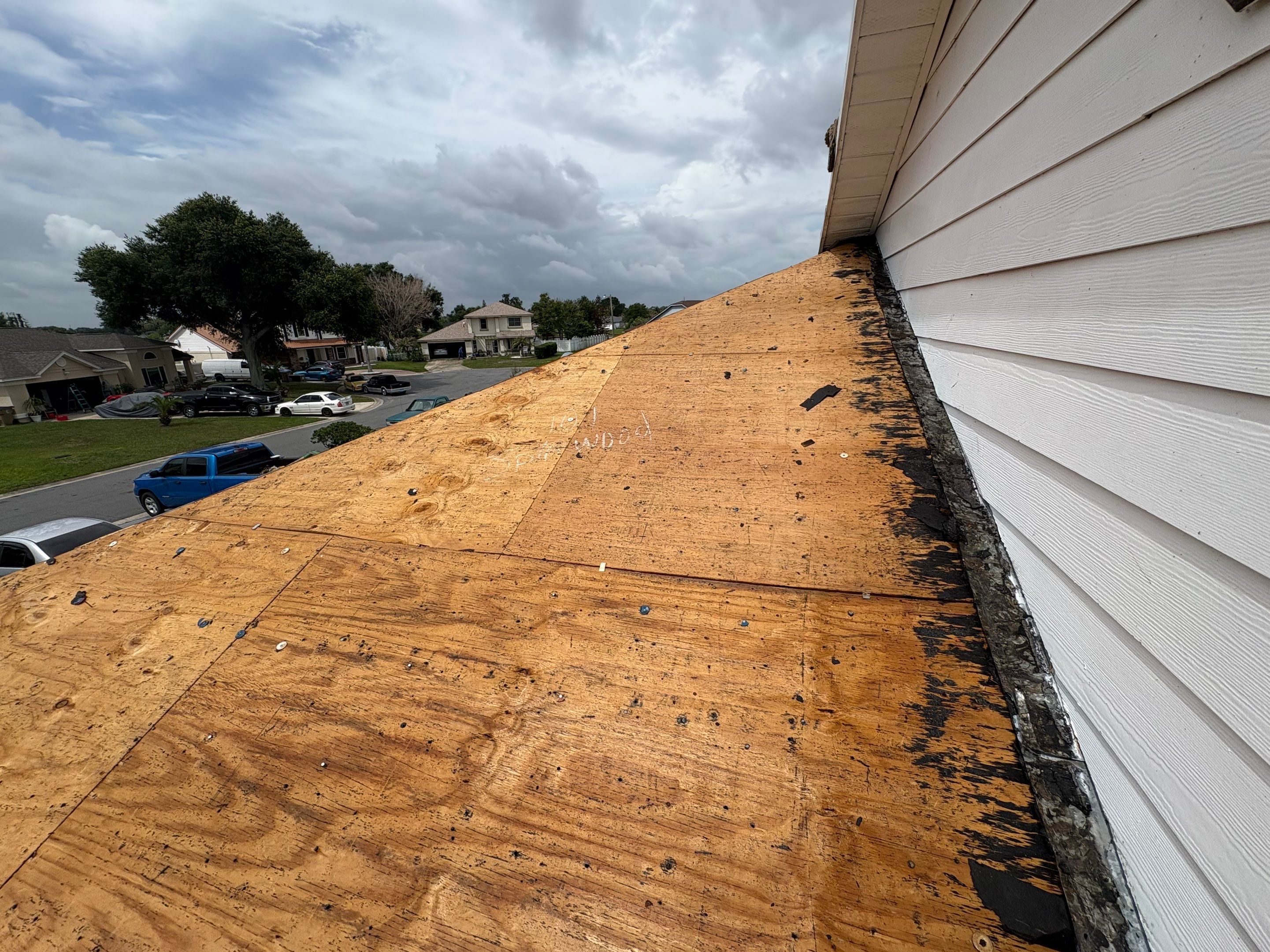 Residential Metal Roofing Installation and Gutter Replacement in Kissimmee by Pinnacle Roofing Group