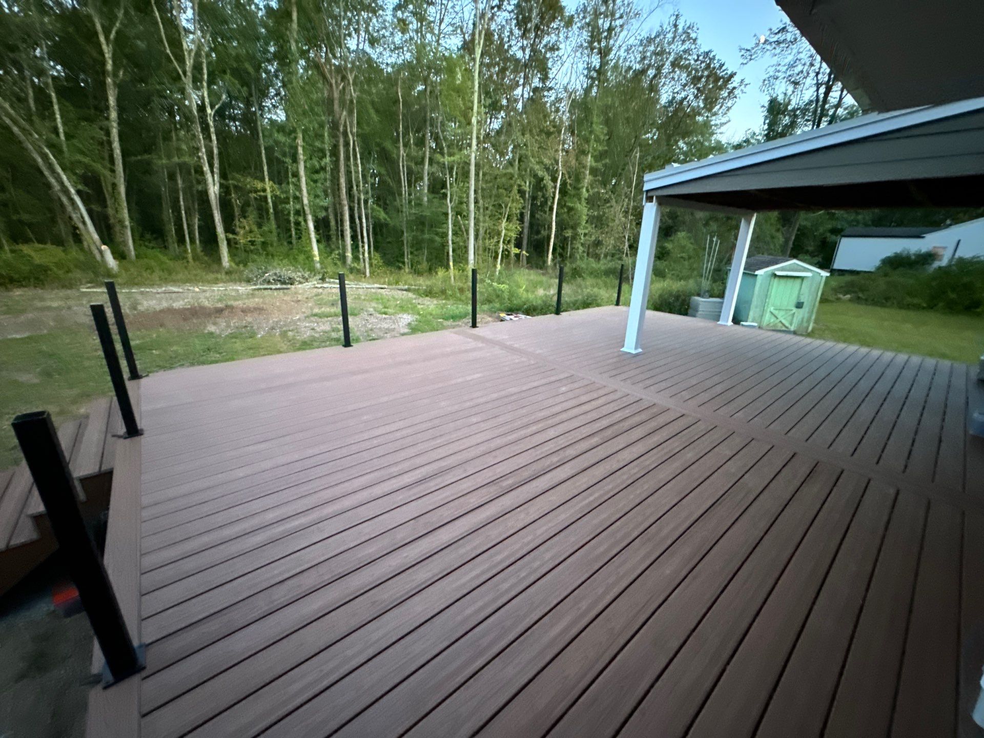 New Deck using Trex Tiki Torch  by deck guardian
