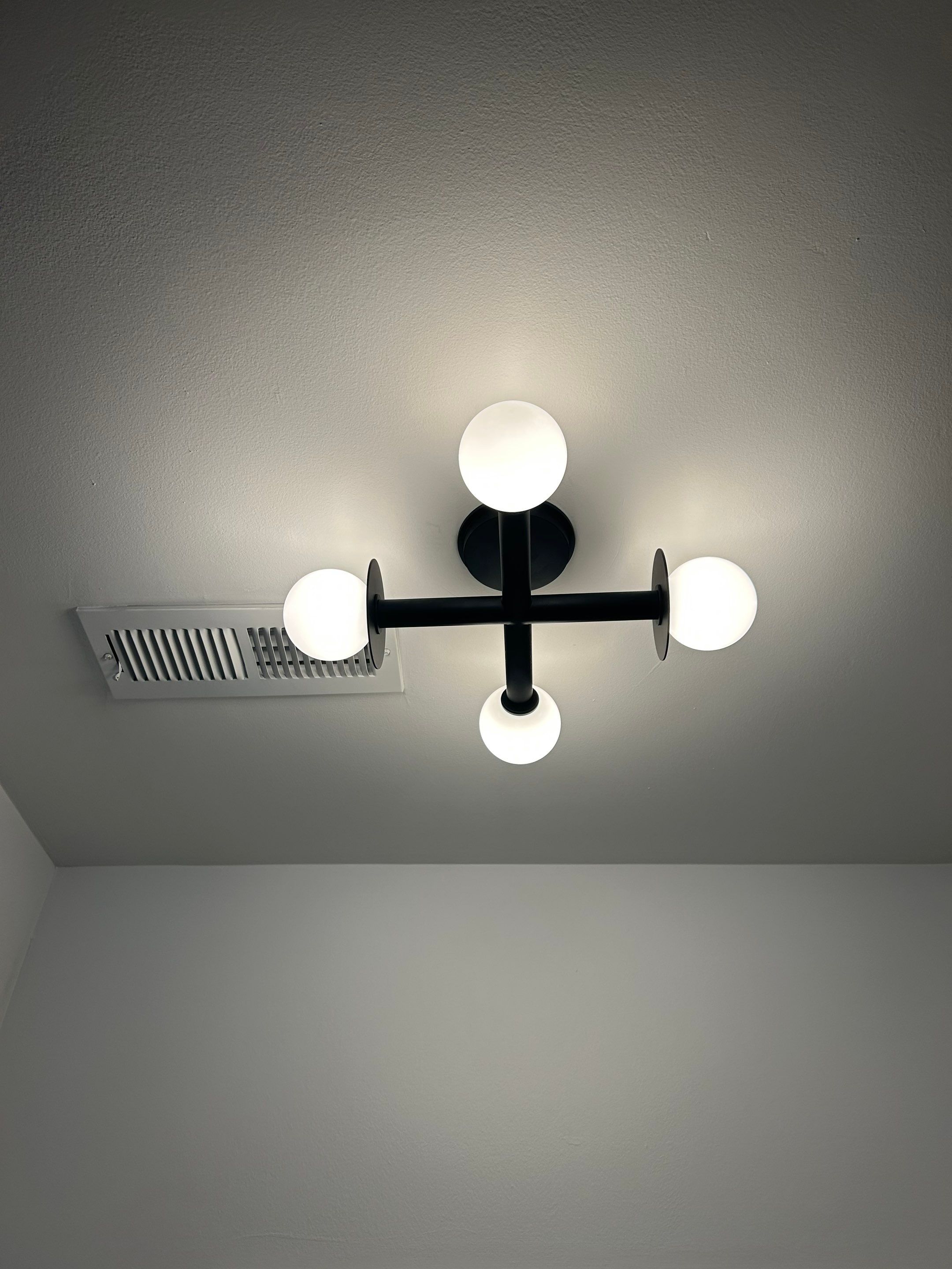Lighting Installation using Chandelier by Staybright Electric